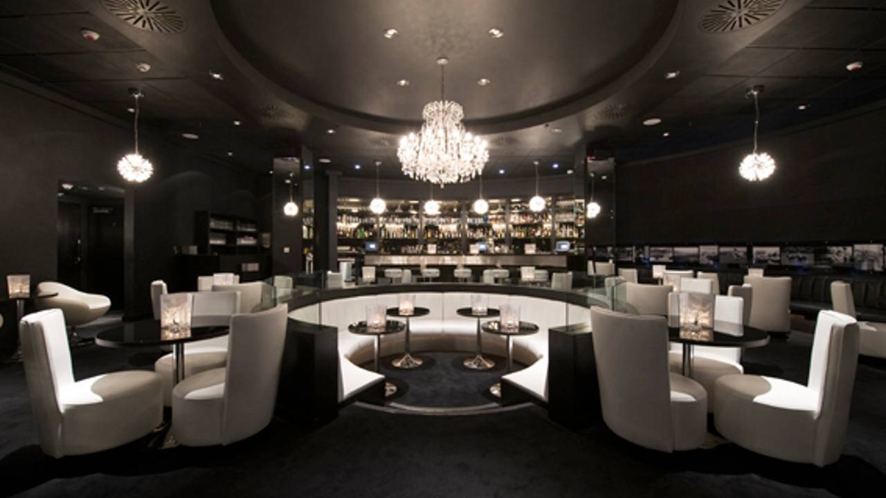 Sophisticated event space at The O2 with elegant chandelier for upscale gatherings.