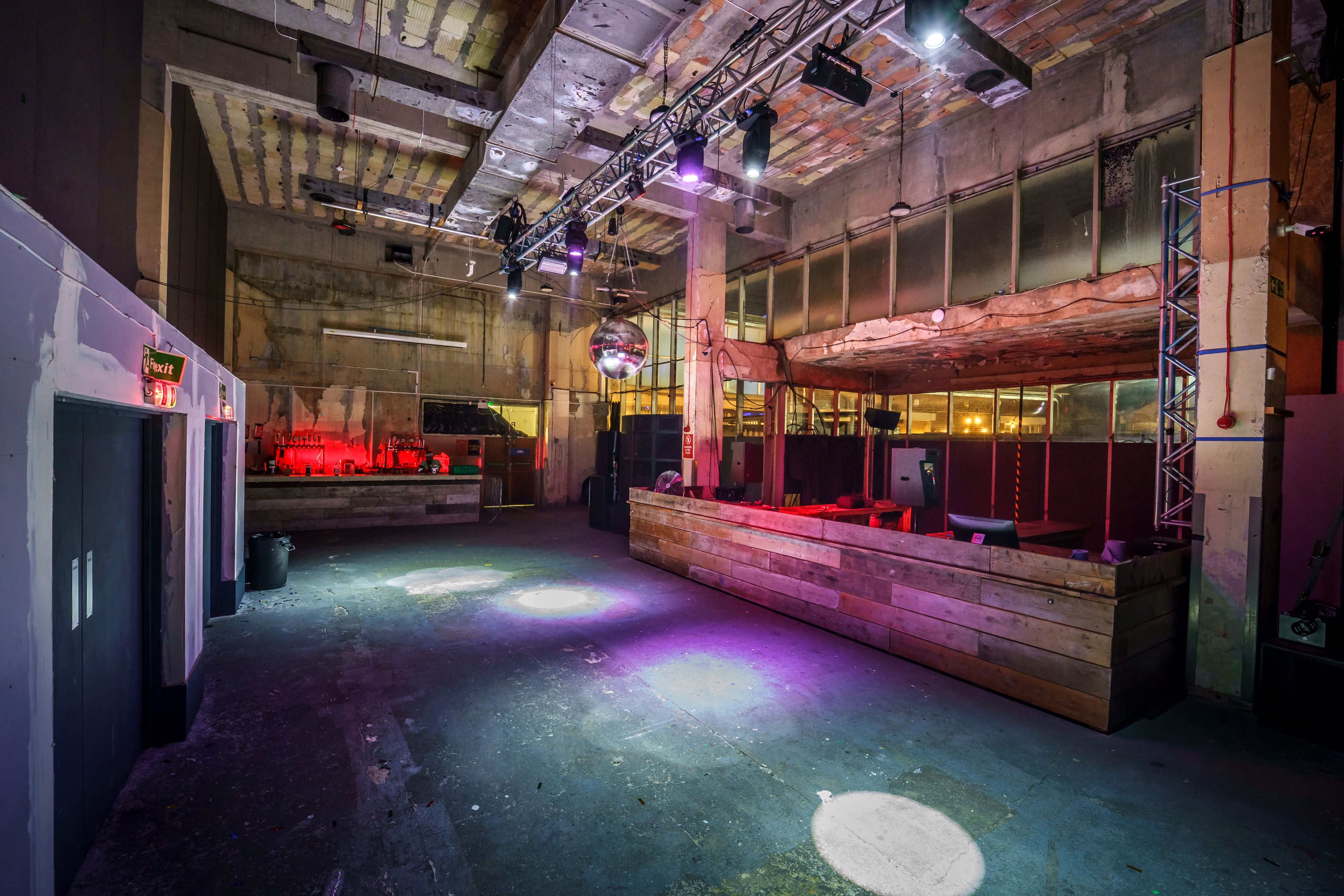 Versatile industrial event space at Warehouse, ideal for gatherings and parties.