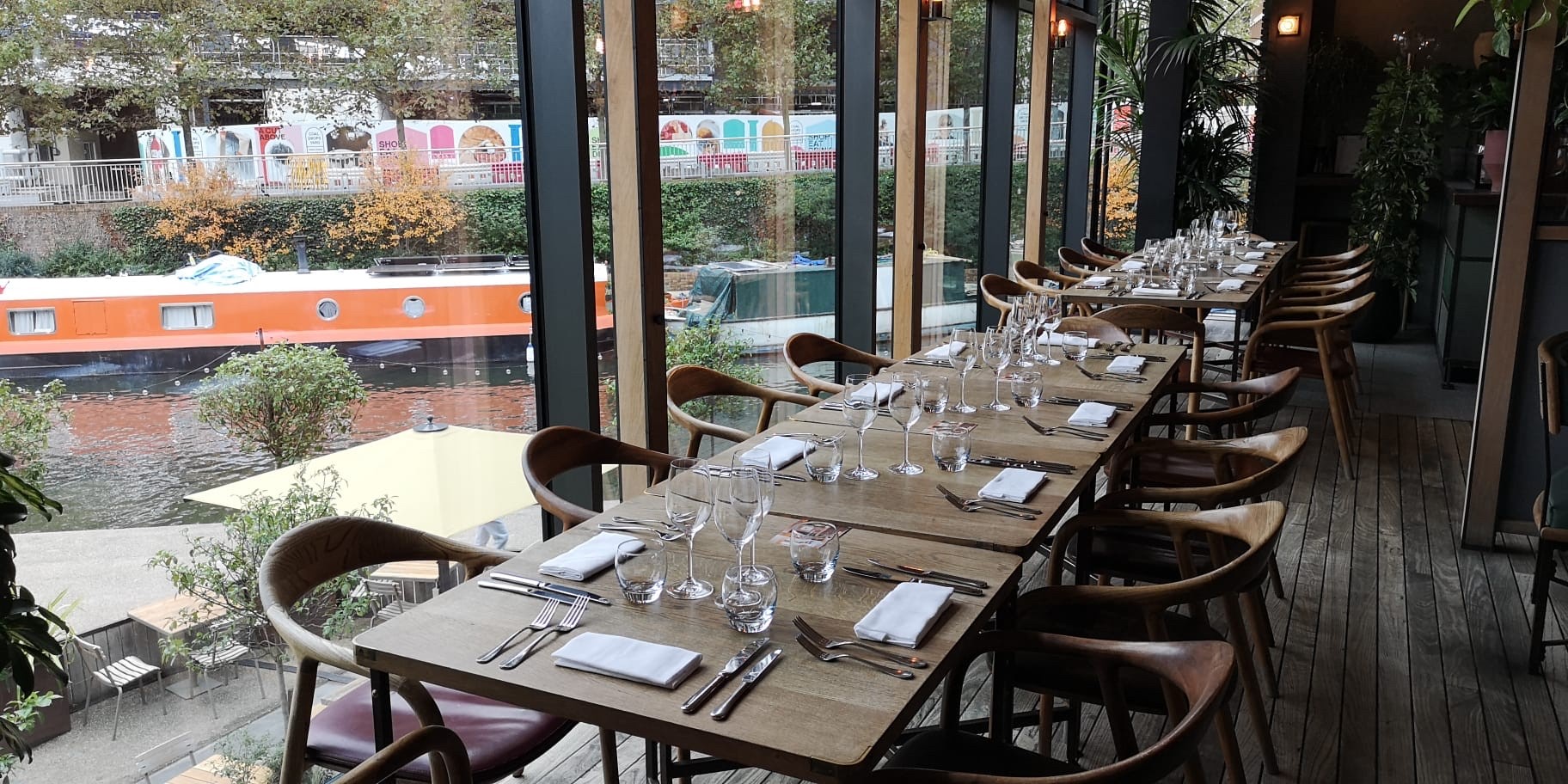 Long table dining setup at The Lighterman, ideal for upscale events and gatherings.