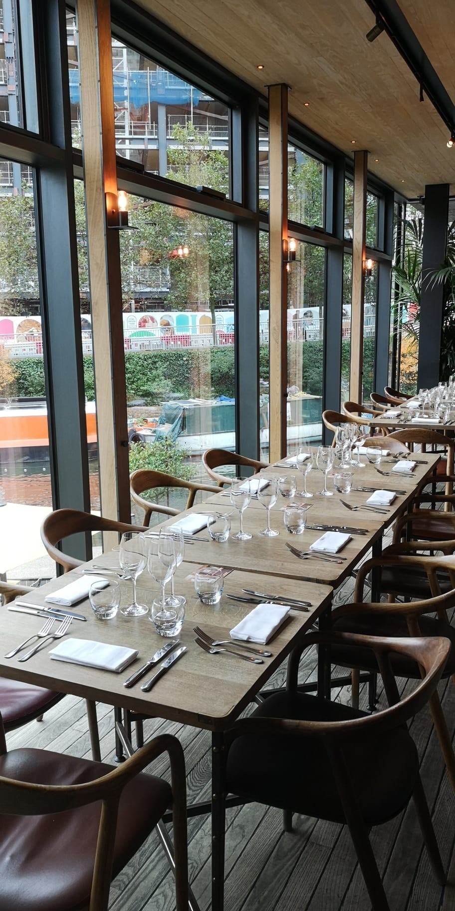 Ground floor long table at The Lighterman, perfect for dining events and gatherings.