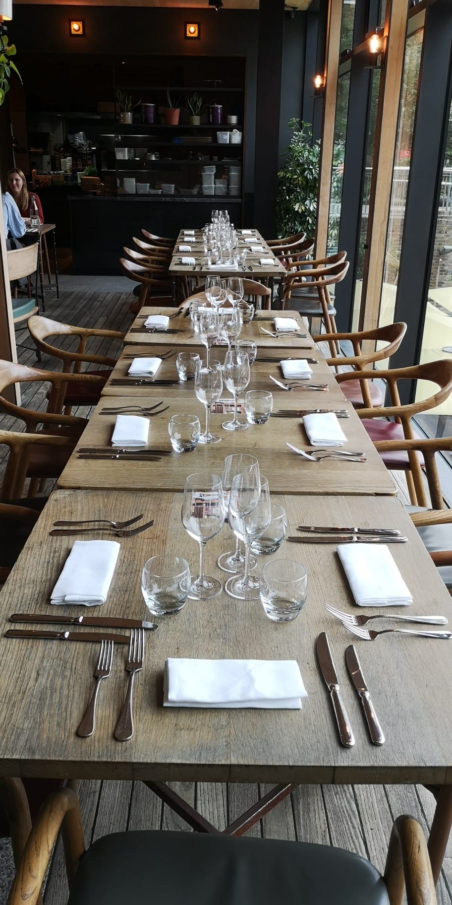 Elegant long dining table set for upscale corporate event at The Lighterman.