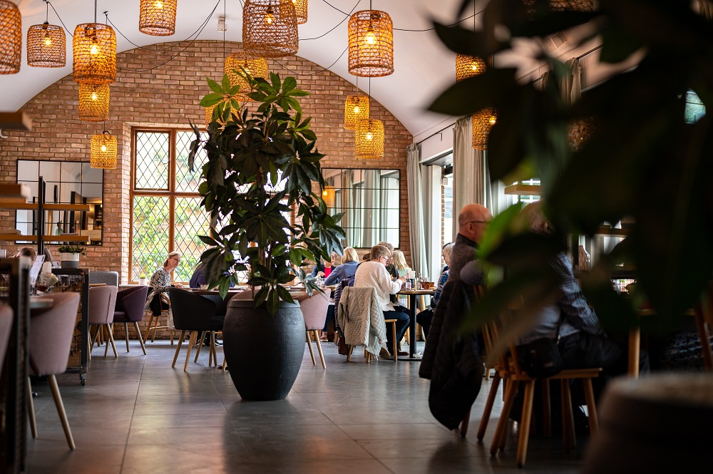 Stylish Coach House Kitchen venue with natural light for meetings and events.