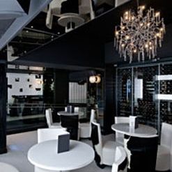 Sleek event space in Leeds with chandelier, ideal for upscale meetings and private dinners.