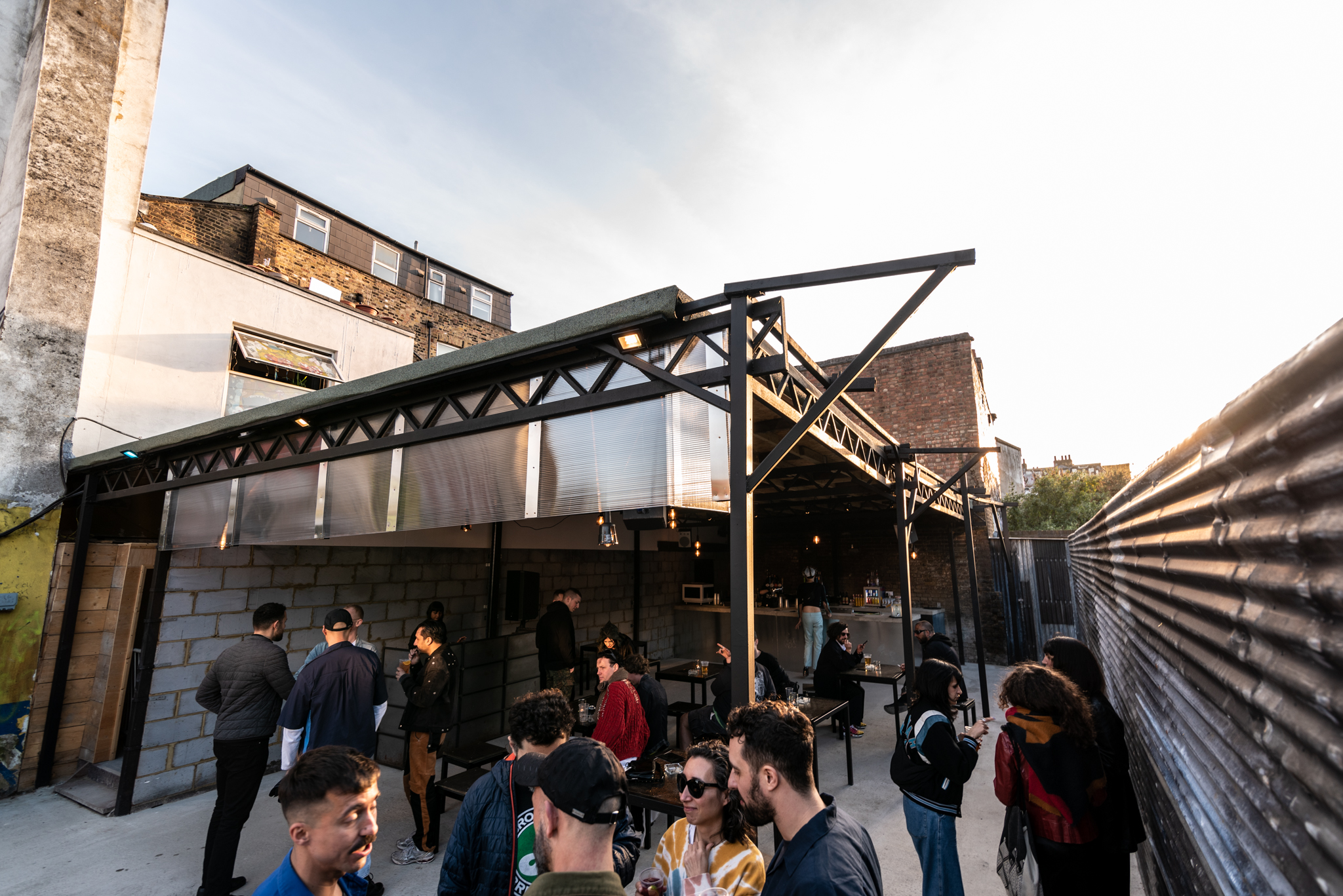 Vibrant outdoor event space with ample seating for casual gatherings and networking.