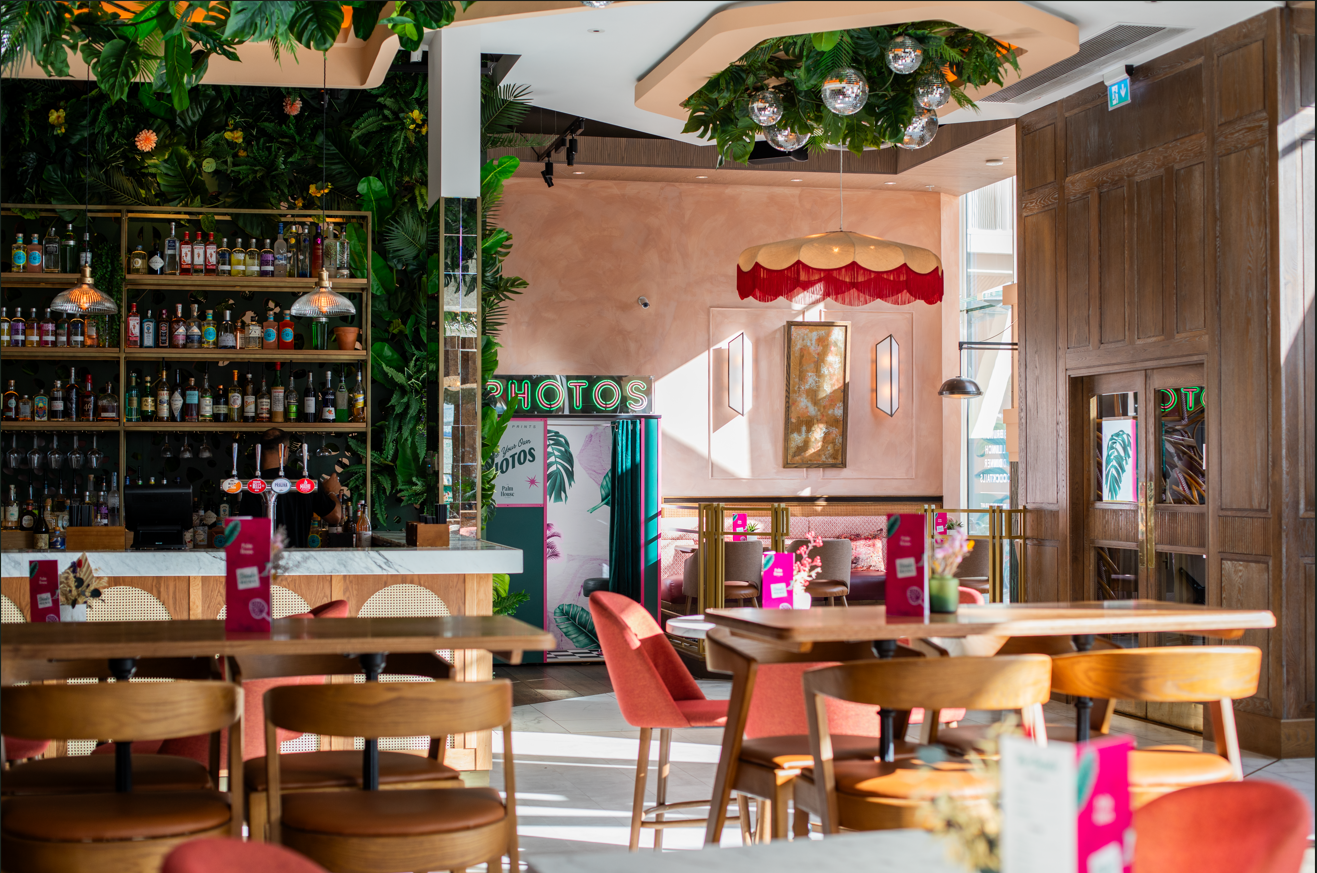 Vibrant Palm House venue with lush greenery for stylish events and gatherings.