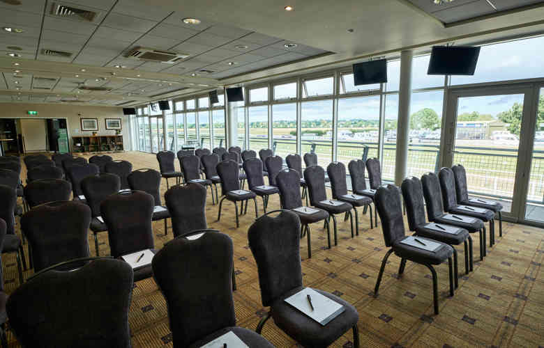 Warwick Racecourse meeting space with natural light, ideal for workshops and presentations.