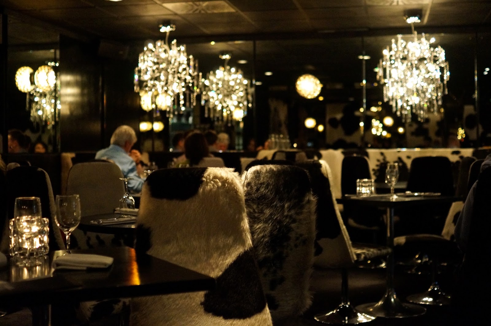 Elegant dining venue in Leeds with chandeliers, perfect for upscale events and gatherings.