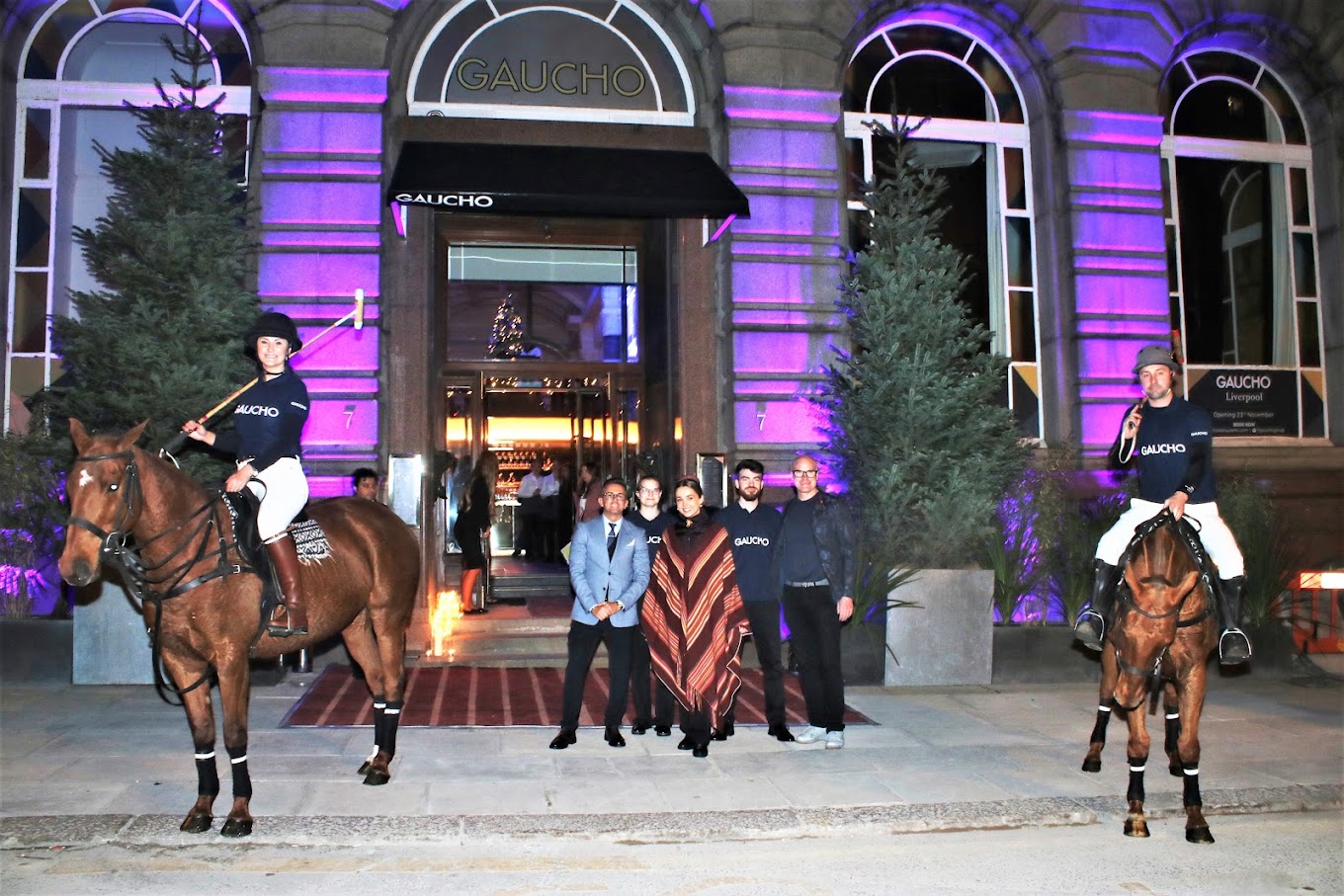 Elegant event entrance at Gaucho Liverpool with mounted riders, perfect for upscale gatherings.