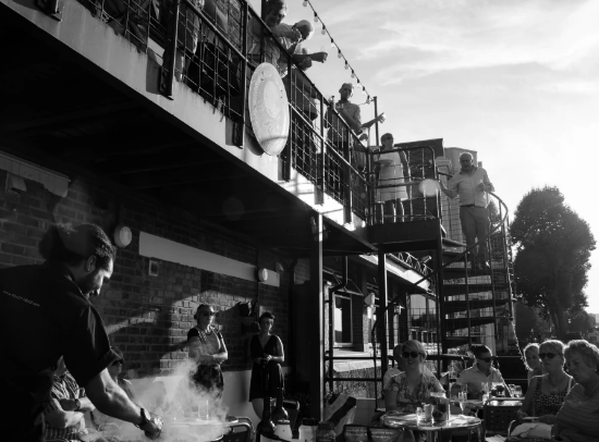 Trafalgar Rowing Centre outdoor event with guests dining and networking.