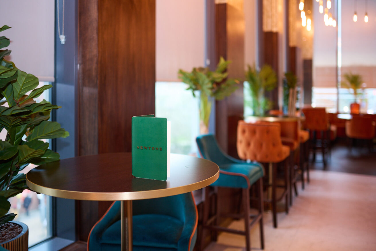 Stylish event space at Newton's Bar, modern decor, ideal for networking and gatherings.