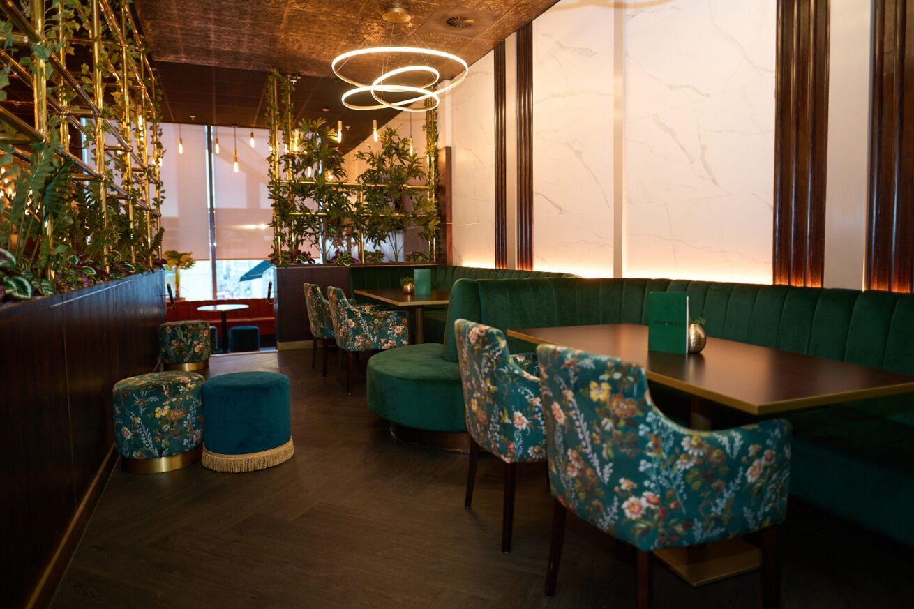 Stylish event space at Newton's Bar, featuring plush seating and elegant decor.