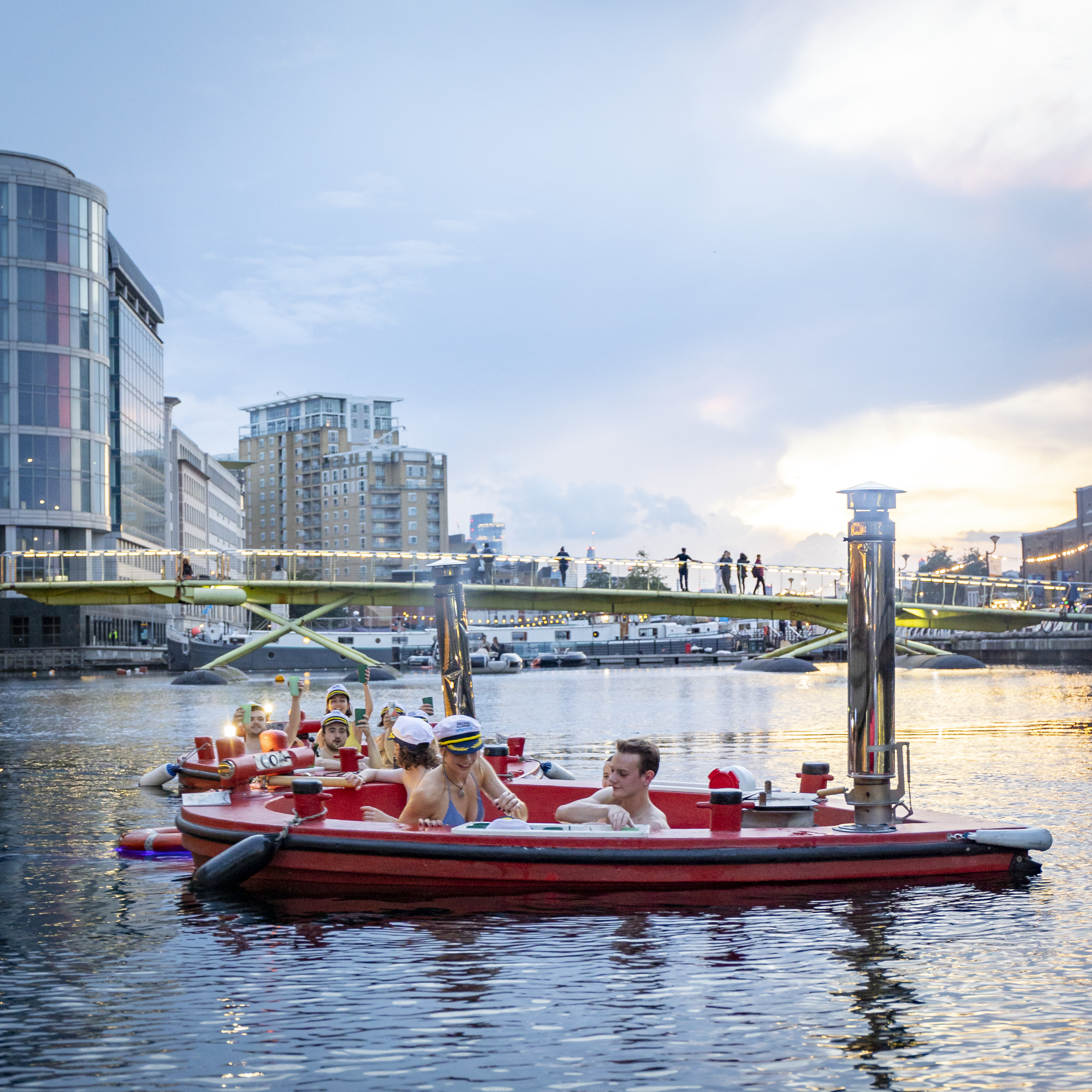 Hot Tub Boat in Skuna: vibrant outdoor networking event with modern architecture.
