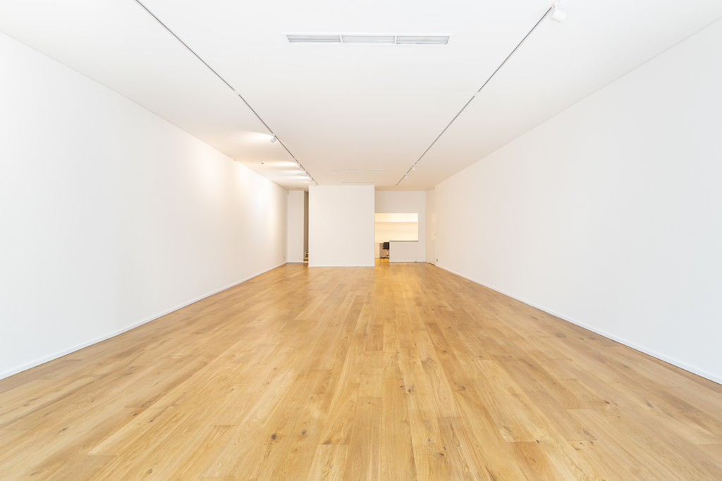 Spacious minimalist event space in Mayfair Gallery, perfect for corporate meetings and workshops.