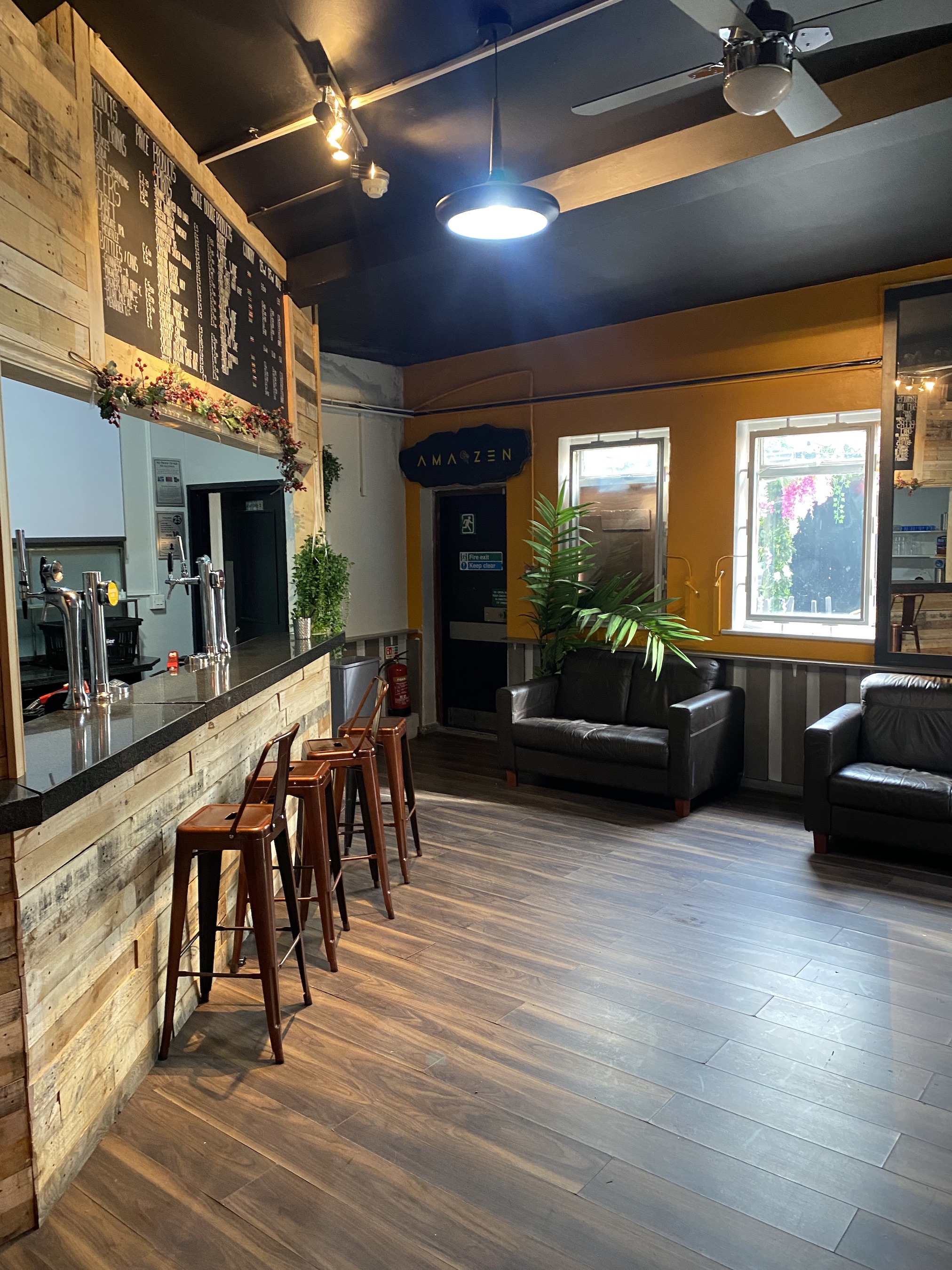 Cozy bar area at The Post in Post Market, perfect for networking events and gatherings.