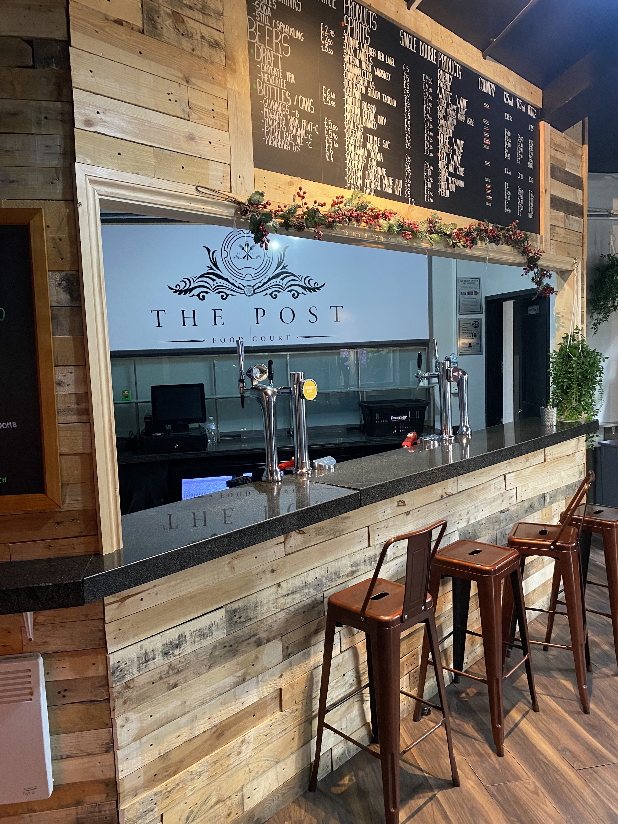 Stylish bar at The Post in Post Market, ideal for networking events and casual gatherings.