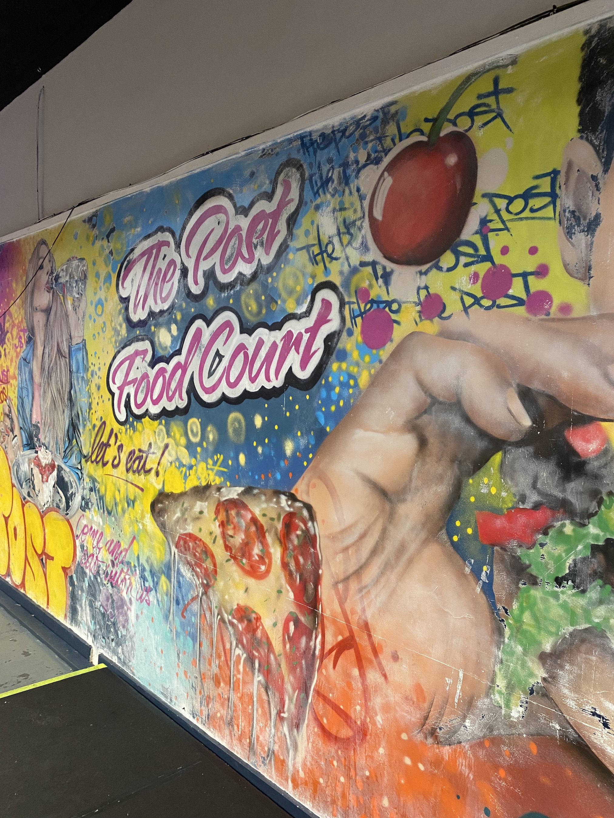 Vibrant mural at The Post Market, perfect for casual gatherings and networking events.