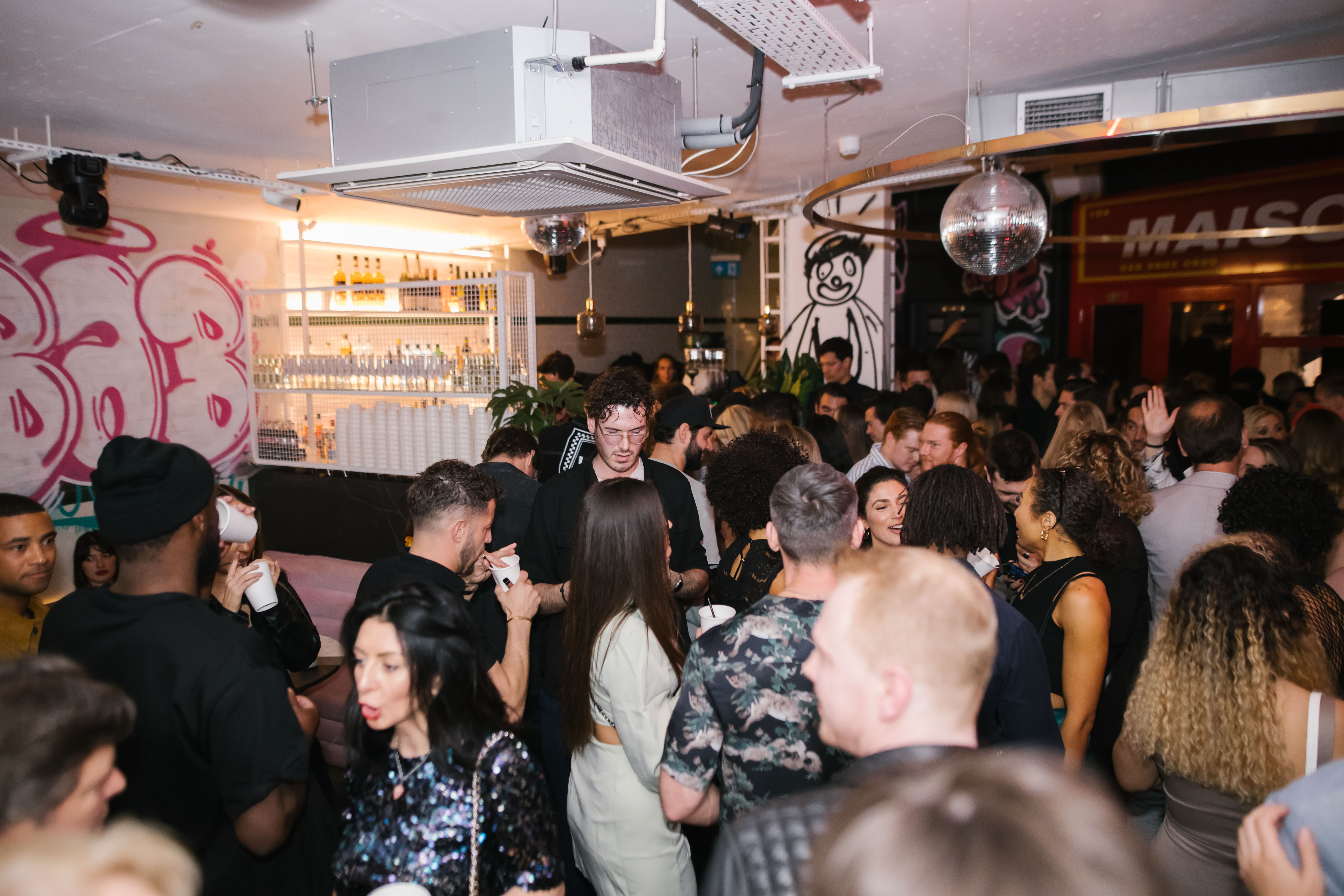 Vibrant networking event at Unique Events - The Lounge, Le Bab with stylish decor.