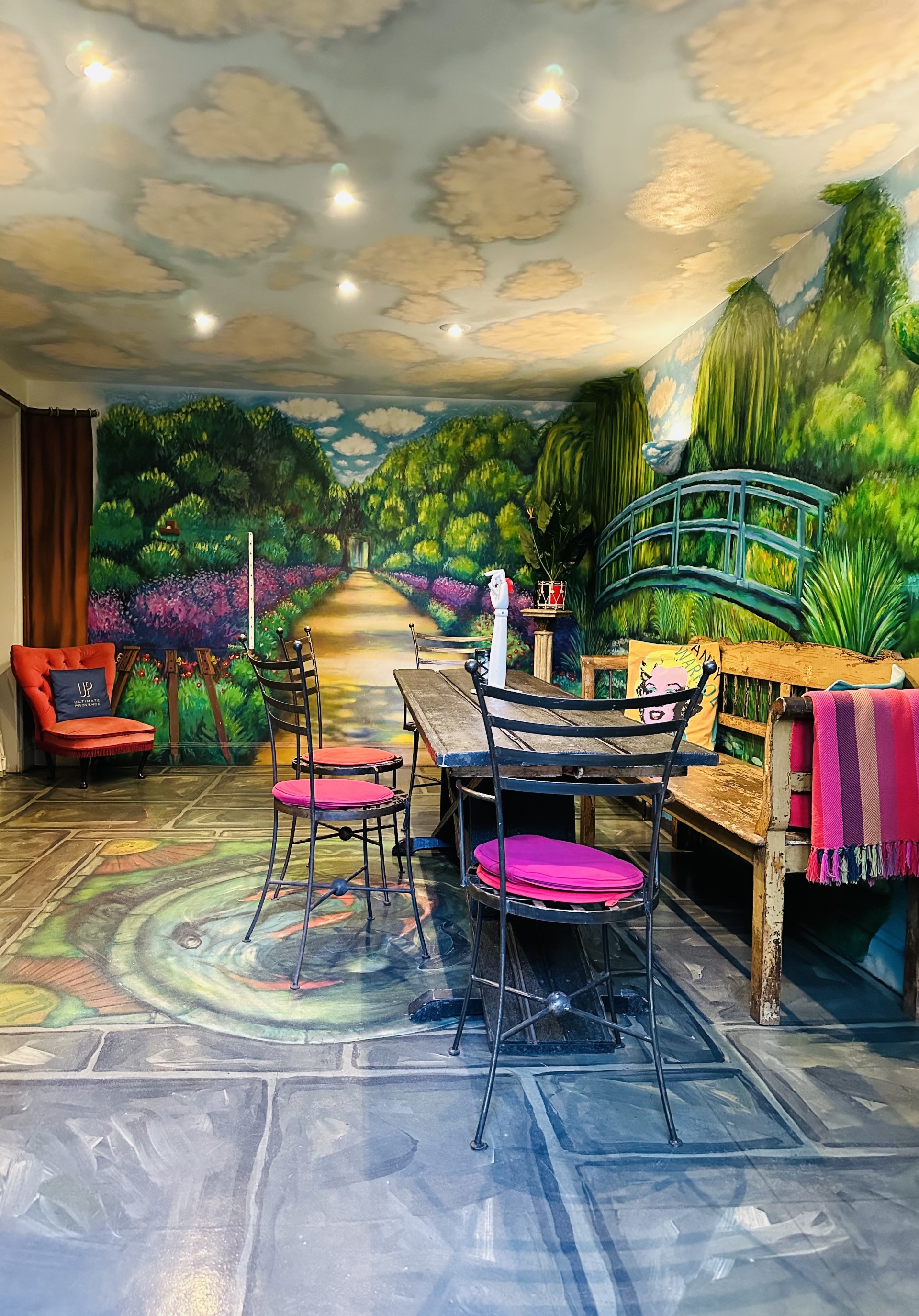 Vout-O-Reenee's vibrant meeting space with mural artwork for creative gatherings.
