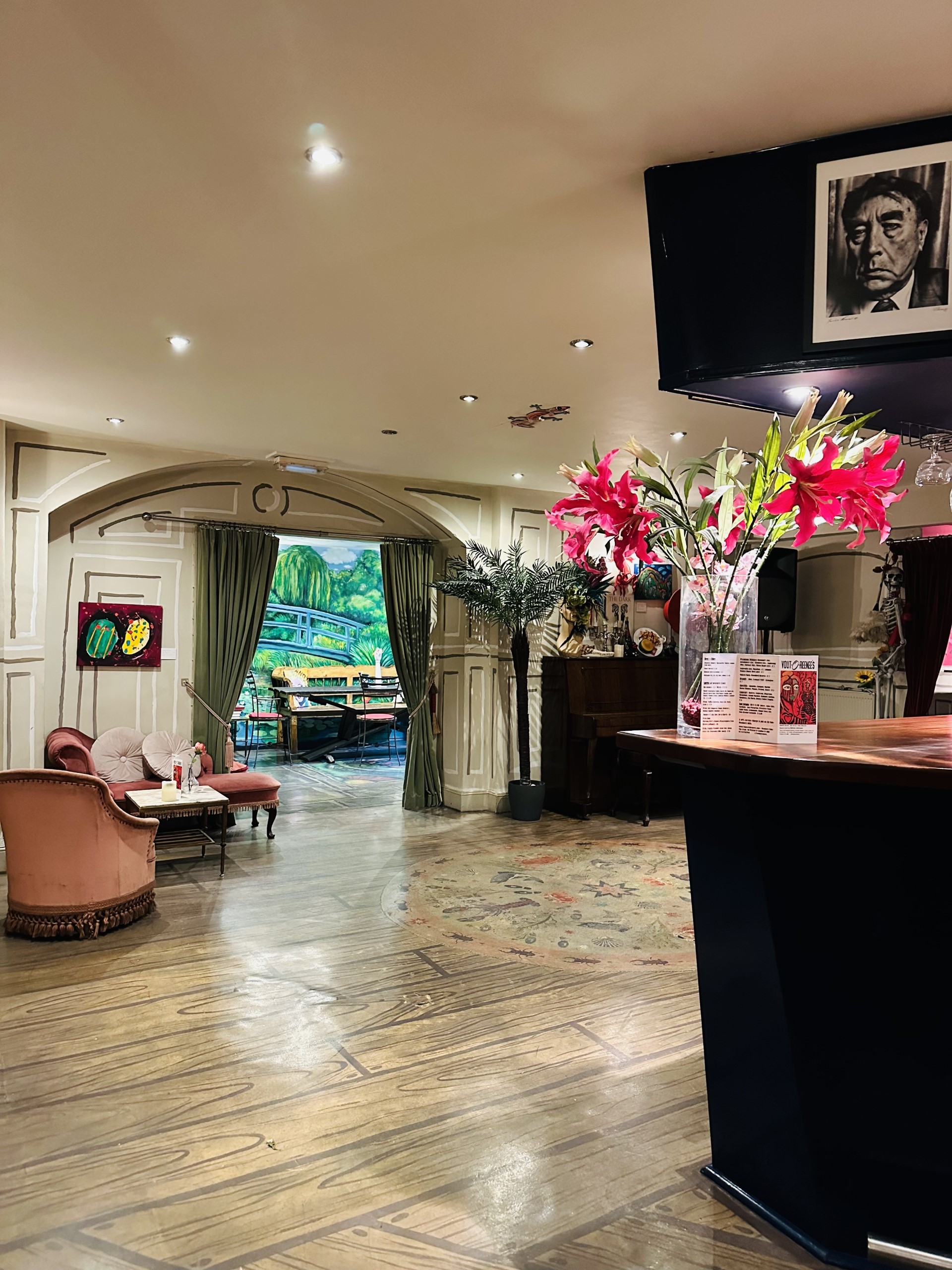 Elegant event space with floral decor, perfect for intimate gatherings or corporate meetings.