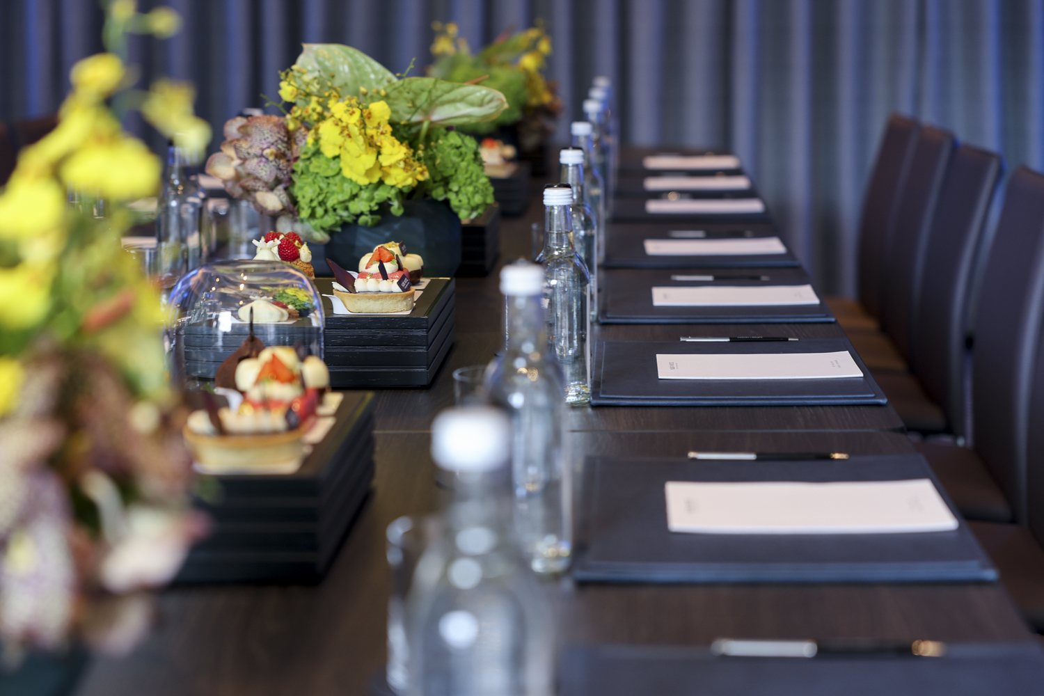 Sakura Boardroom at Nobu Hotel: elegant meeting space with floral centerpieces and modern design.