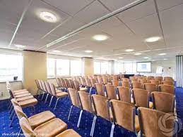 Huntingdon Racecourse conference room with natural light, ideal for events and workshops.