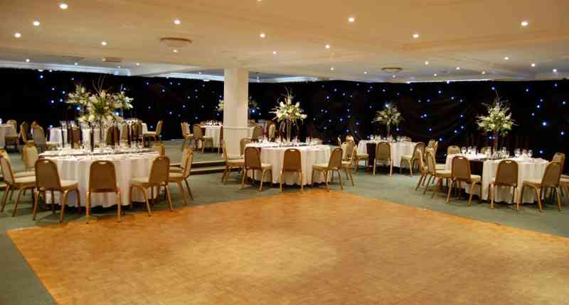Elegant event space with round tables for weddings and corporate gatherings at Market Rasen.