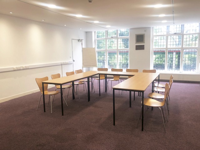 Versatile Scott Room in Oxford House, ideal for workshops with natural light and flexible layout.
