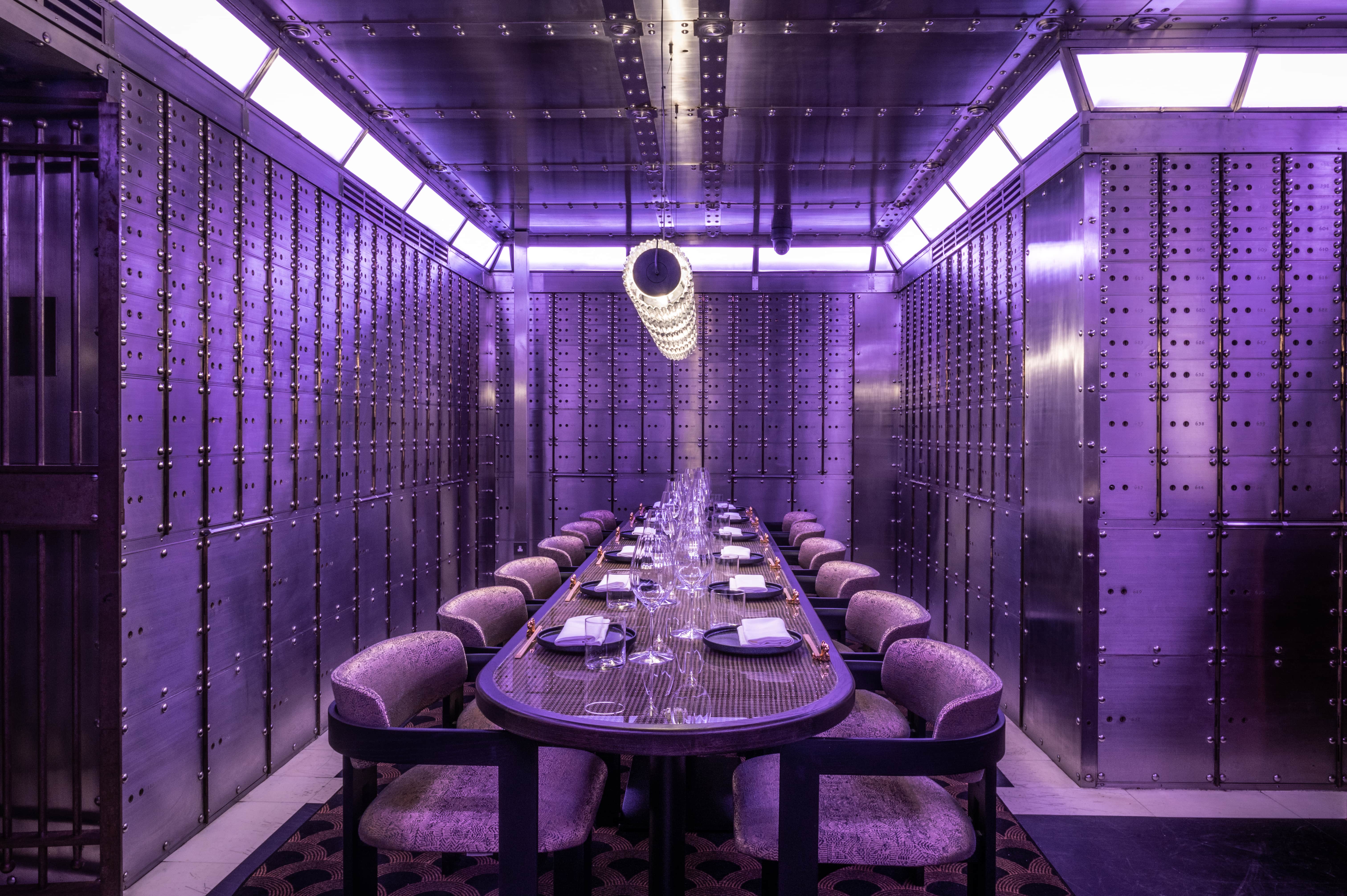 Sleek dining space with metallic walls for exclusive corporate events in Manchester.