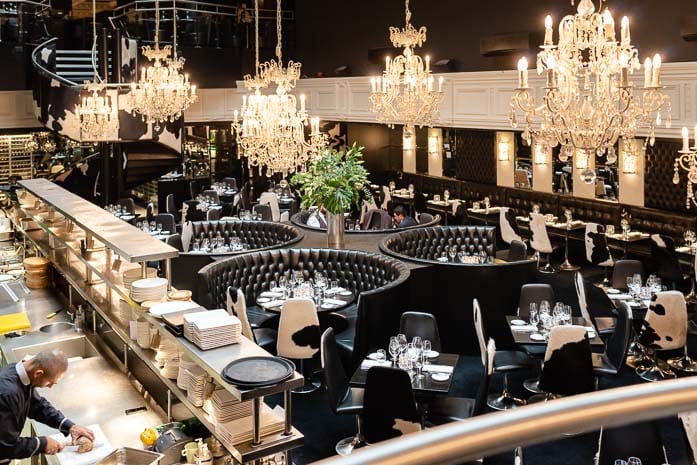 Sophisticated dining venue in Manchester with elegant chandeliers for upscale events.