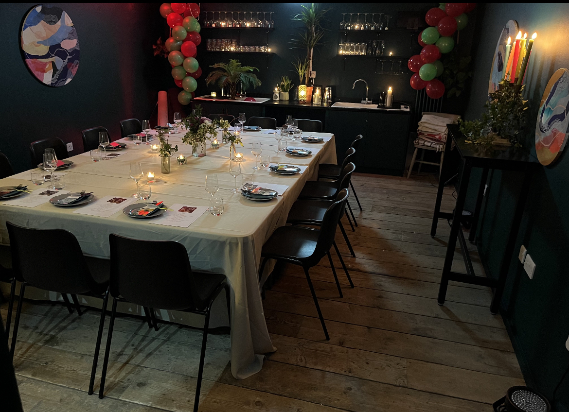 Elegant dining table setup in cozy Studio 57, perfect for private events and gatherings.