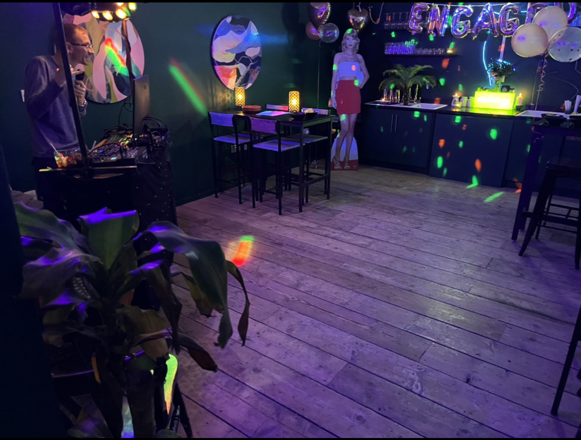 Vibrant Studio 57 event space with colorful lighting for parties and gatherings.