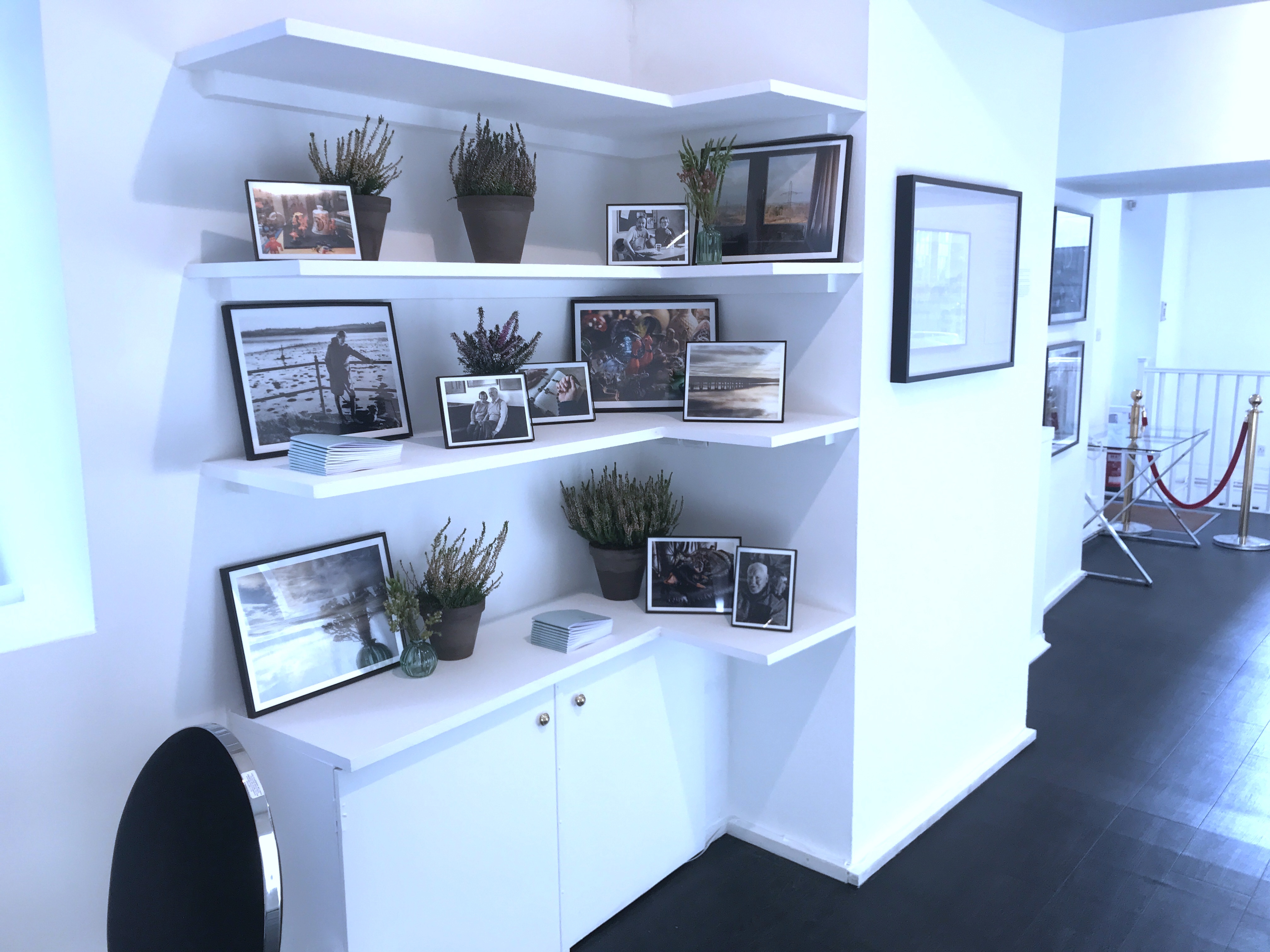 Proud Galleries display area with framed photos, ideal for networking events and meetings.