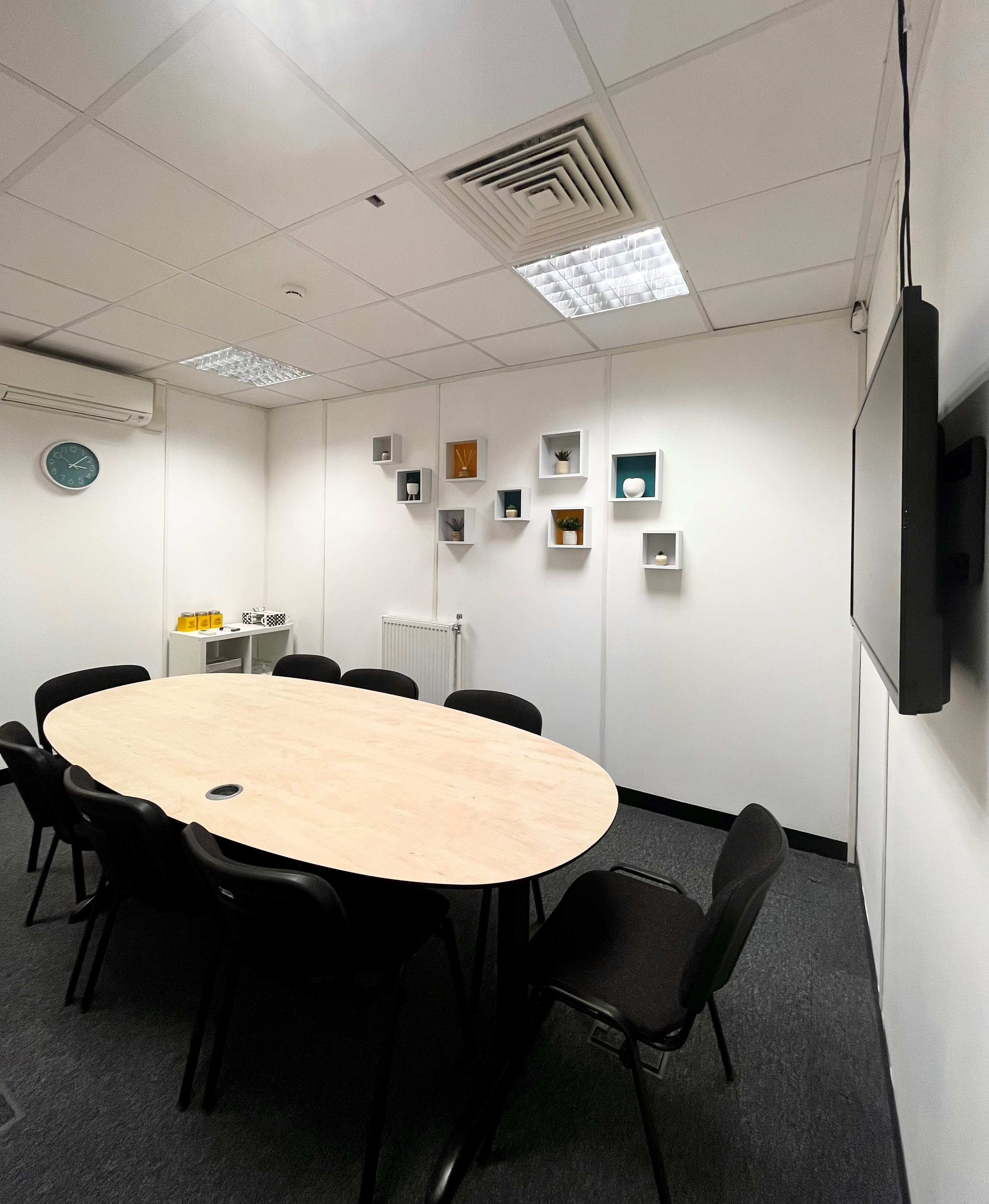 Mersey suite at UBC Thursby House, modern meeting room with oval table for collaboration.