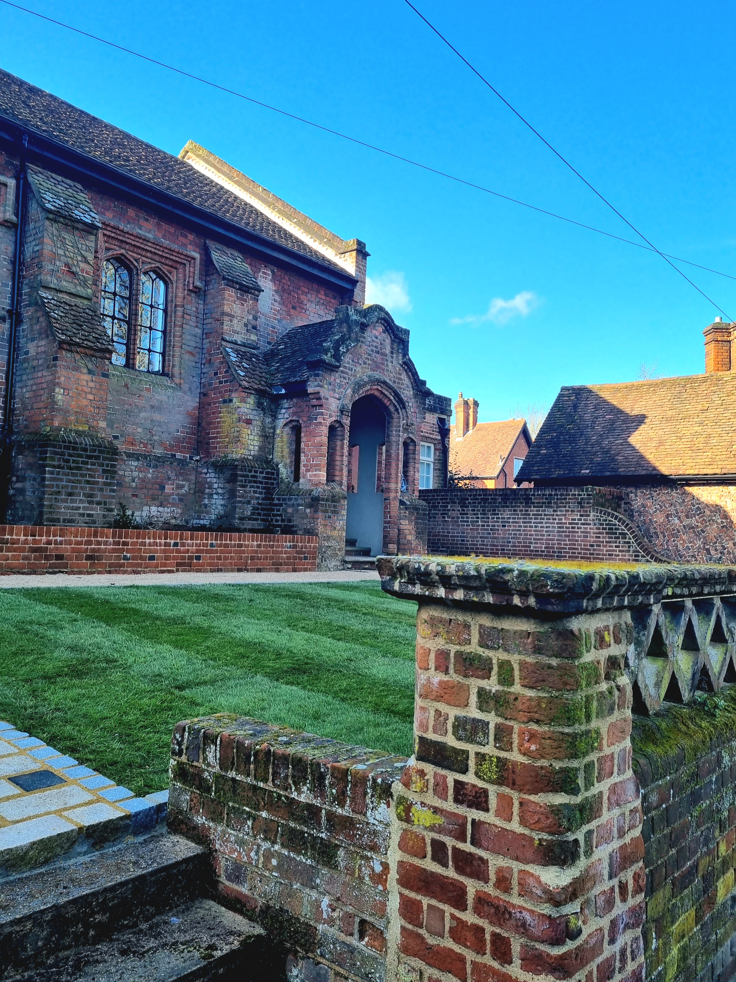 Charming historic venue with lush lawn for intimate gatherings and outdoor events.