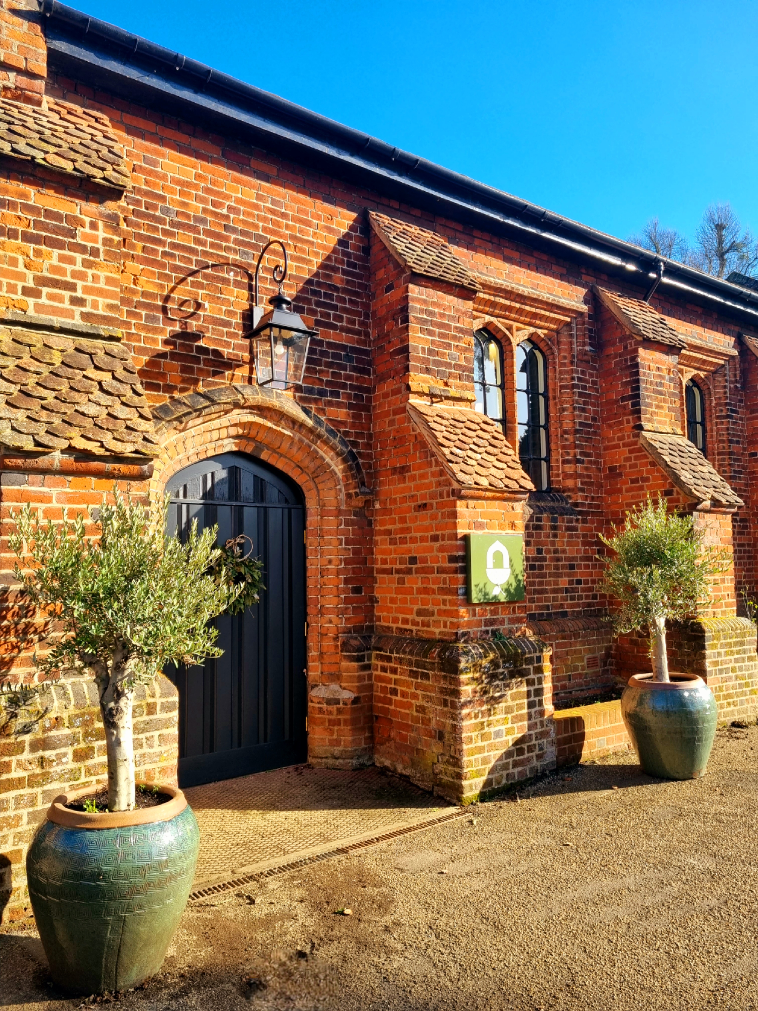 Charming brick venue at The Oak House Studio for intimate gatherings and corporate retreats.