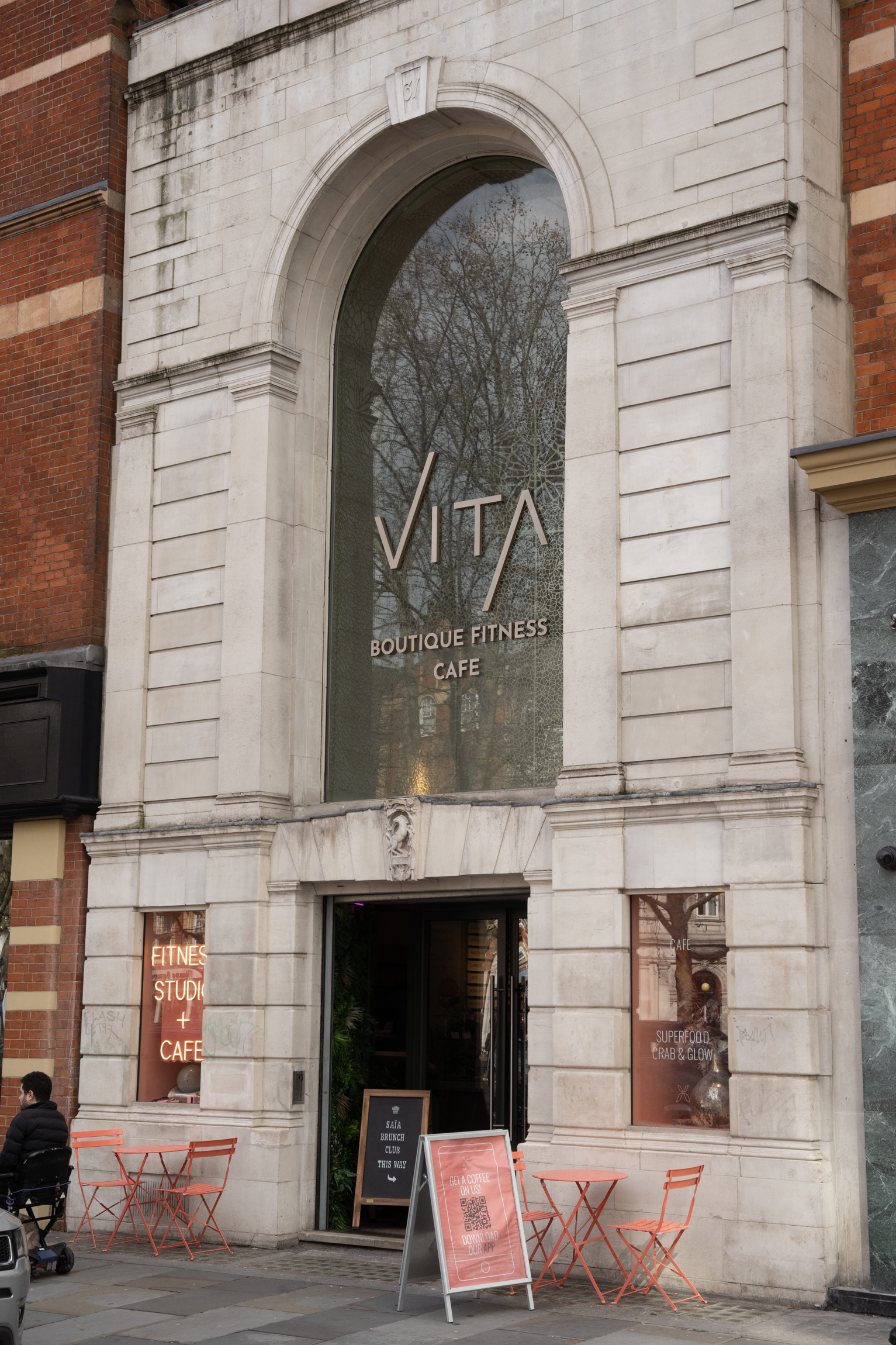Stylish entrance of Vita Cafe, a boutique fitness venue for wellness events.