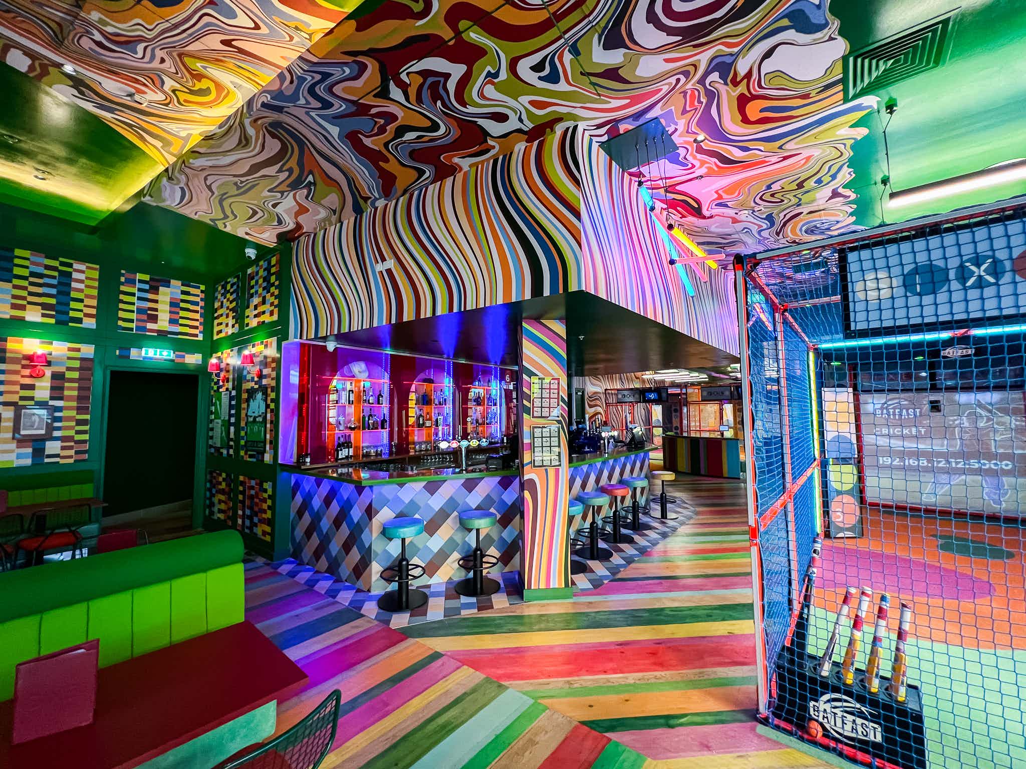 Vibrant venue at Sixes Social Cricket for creative events and team-building activities.