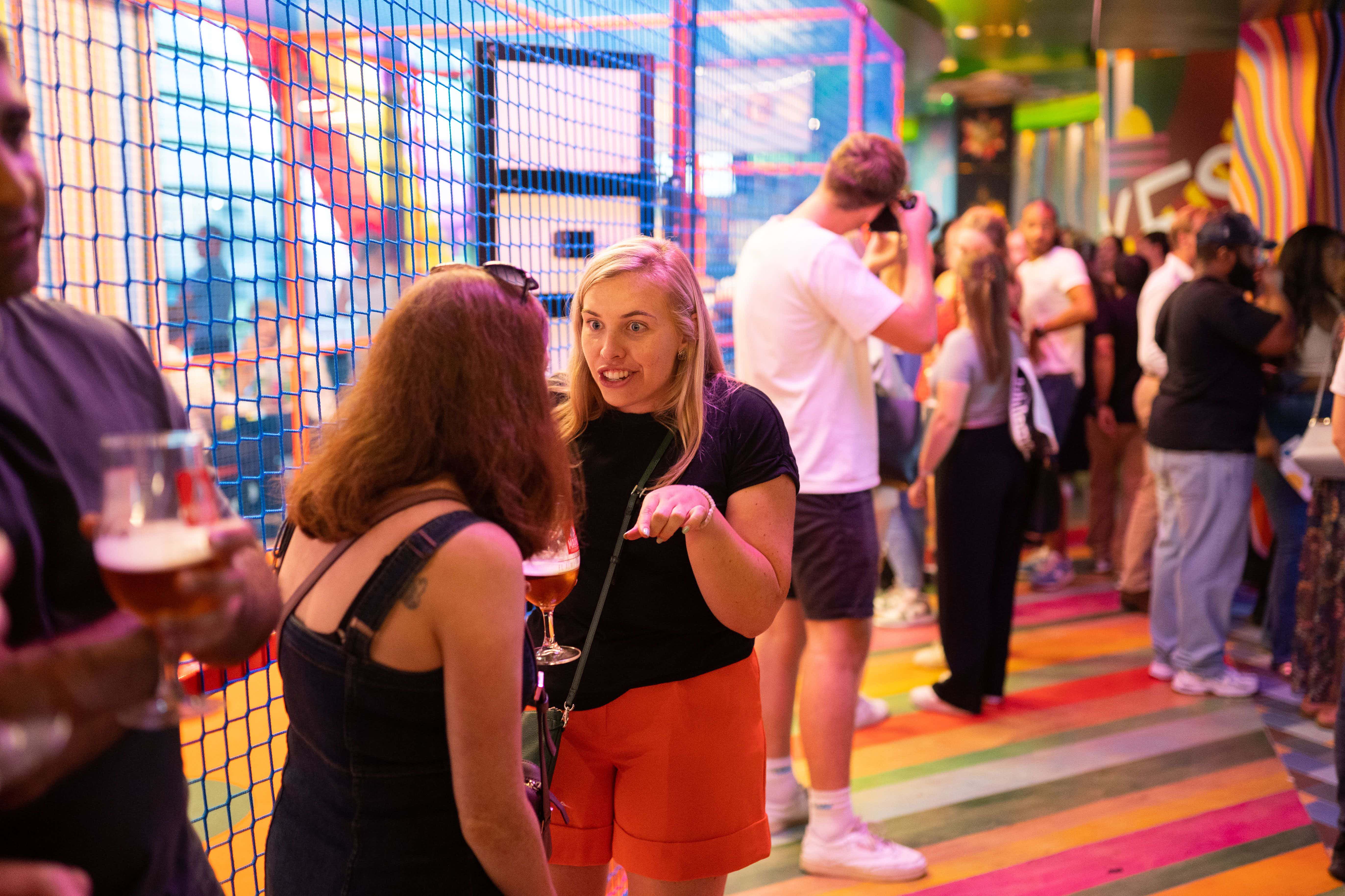 Vibrant event space at Sixes Social Cricket, perfect for networking and social gatherings.