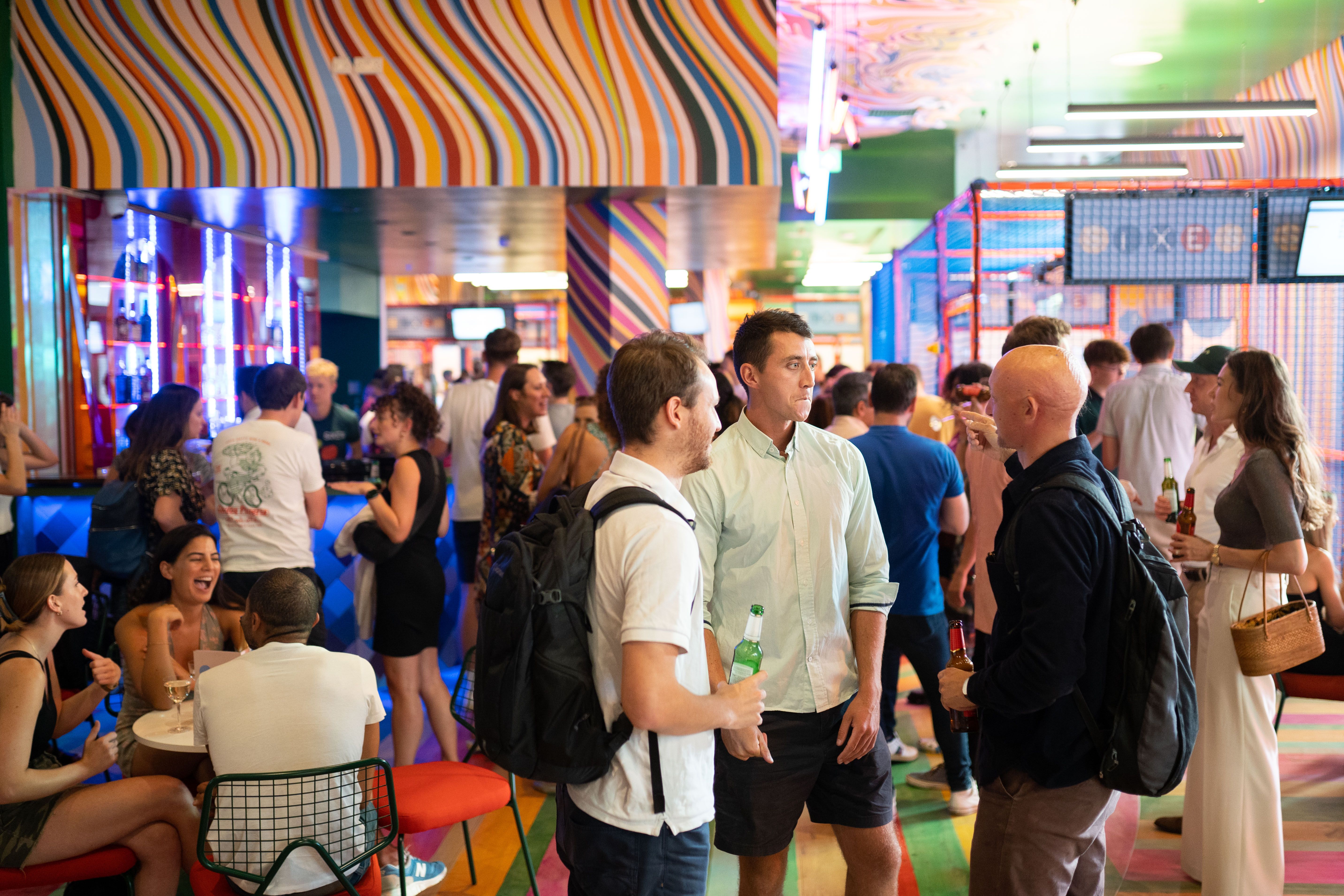 Vibrant event space at Sixes Social Cricket, ideal for networking and social gatherings.