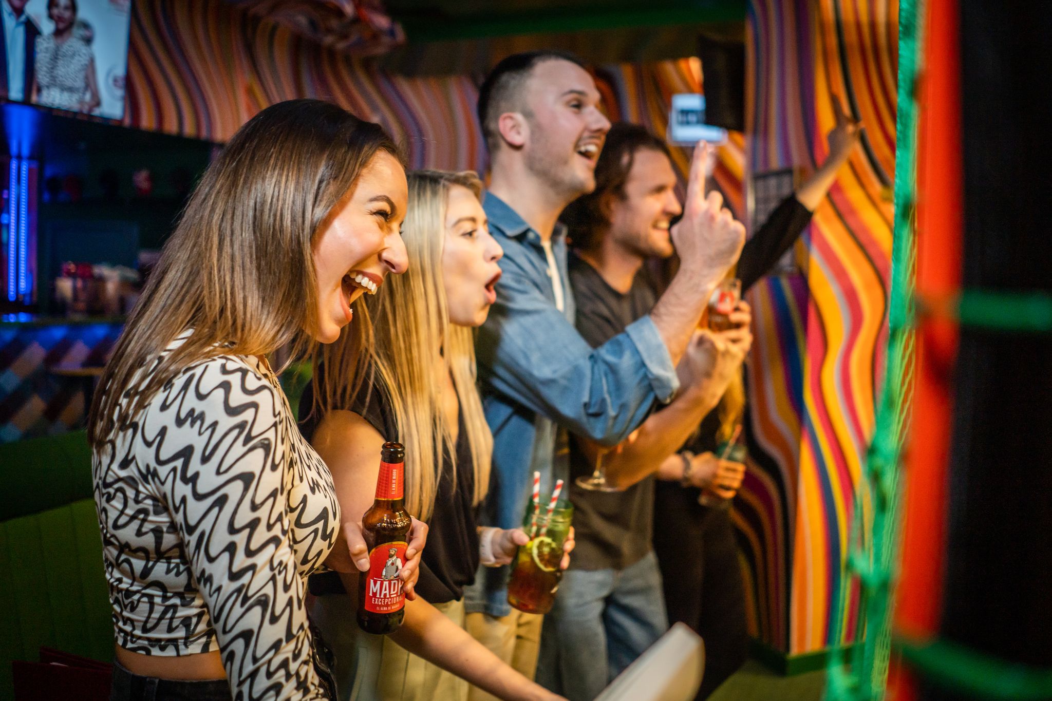 Lively group at The Arena, Sixes Social Cricket, enjoying a fun team-building event.