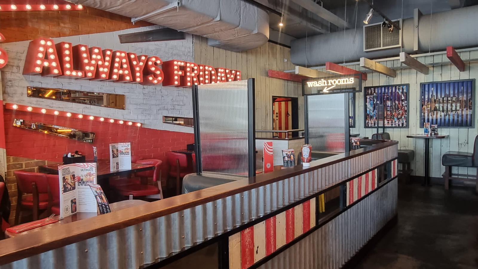 Semi-private dining area at TGI Friday's Brighton Marina for casual corporate events.