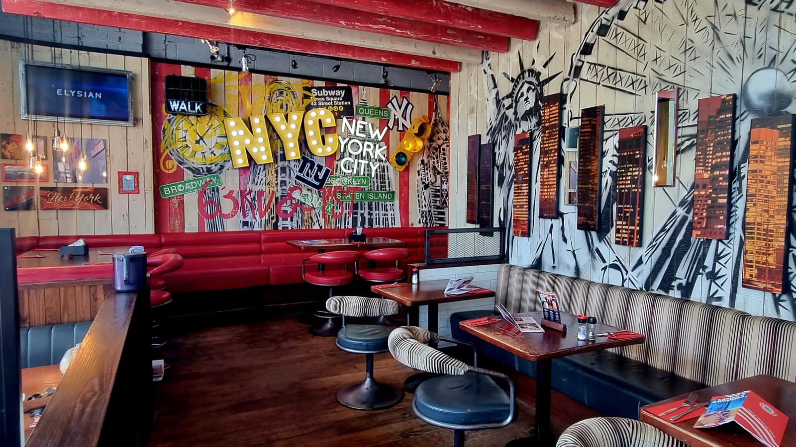 Semi-private area at TGI Friday's Brighton Marina, vibrant NYC theme for casual events.