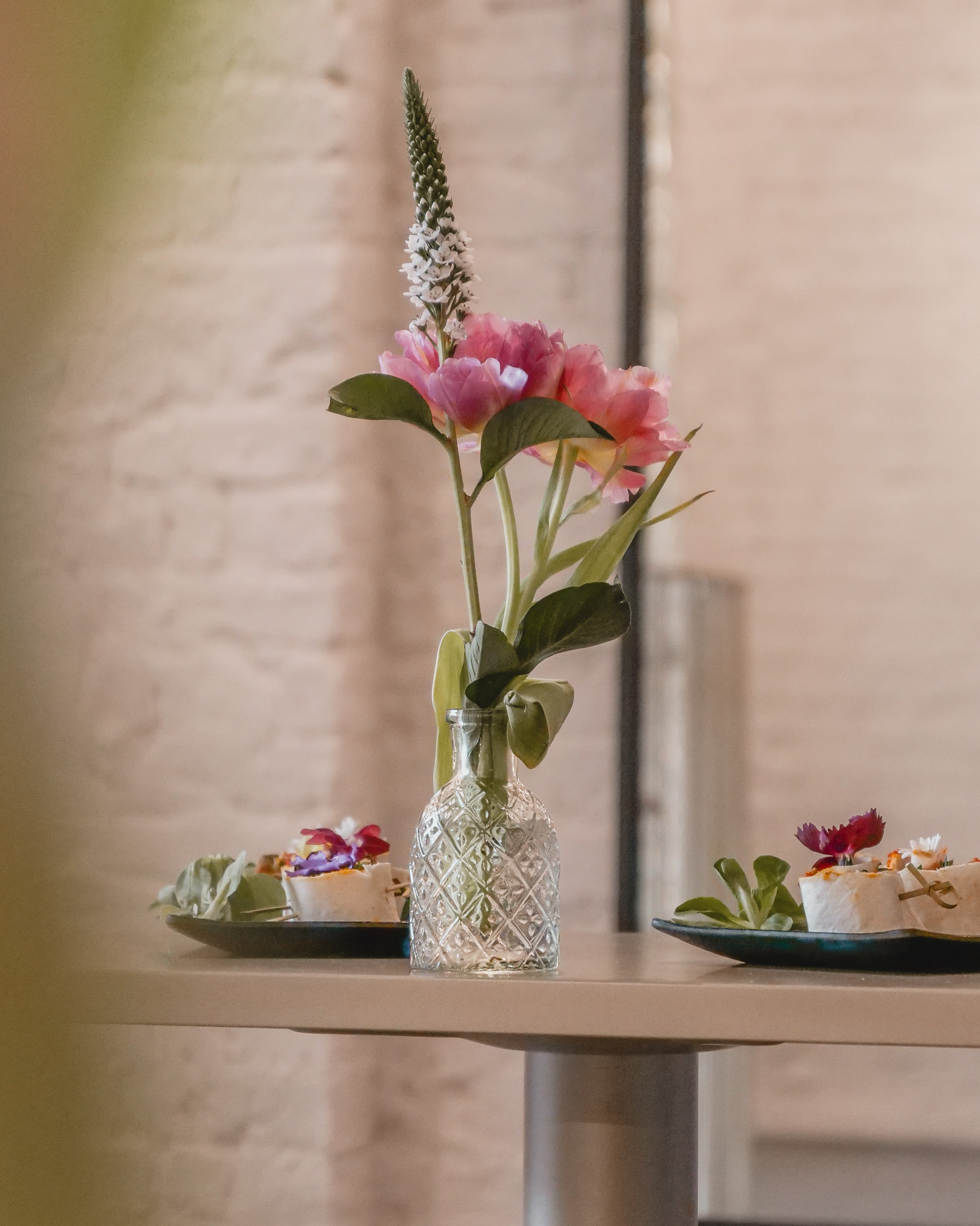 Elegant floral centerpiece at Sunrise Studio, perfect for weddings and corporate events.