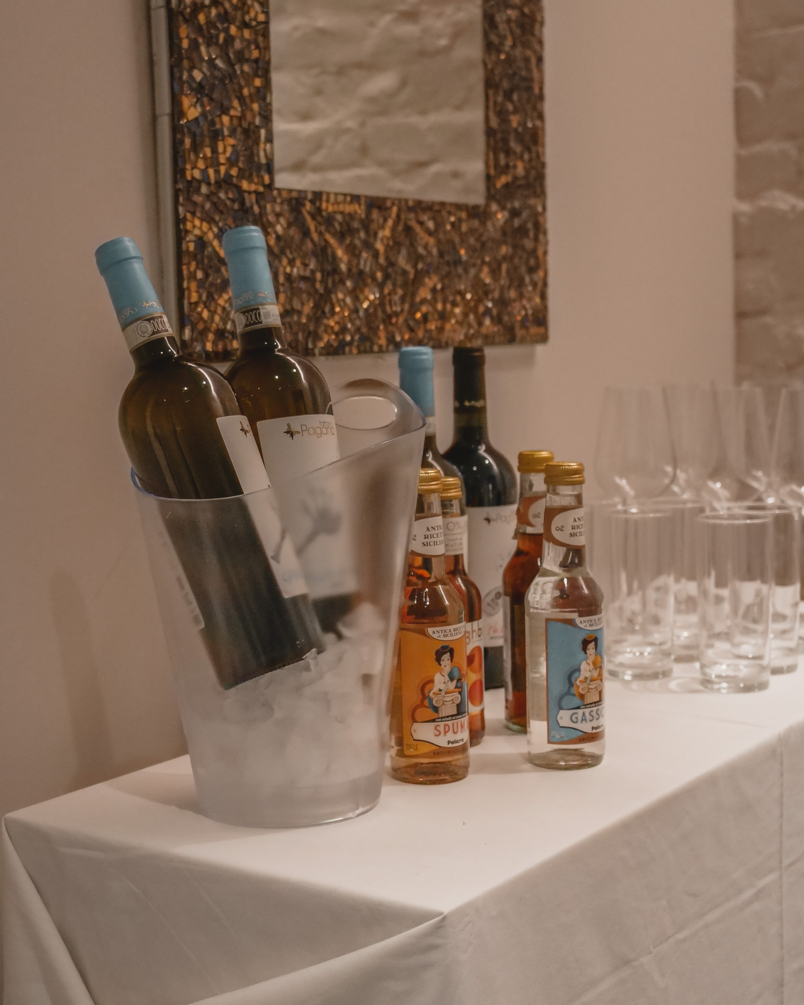 Elegant beverage station with chilled white wine for a sophisticated networking event.