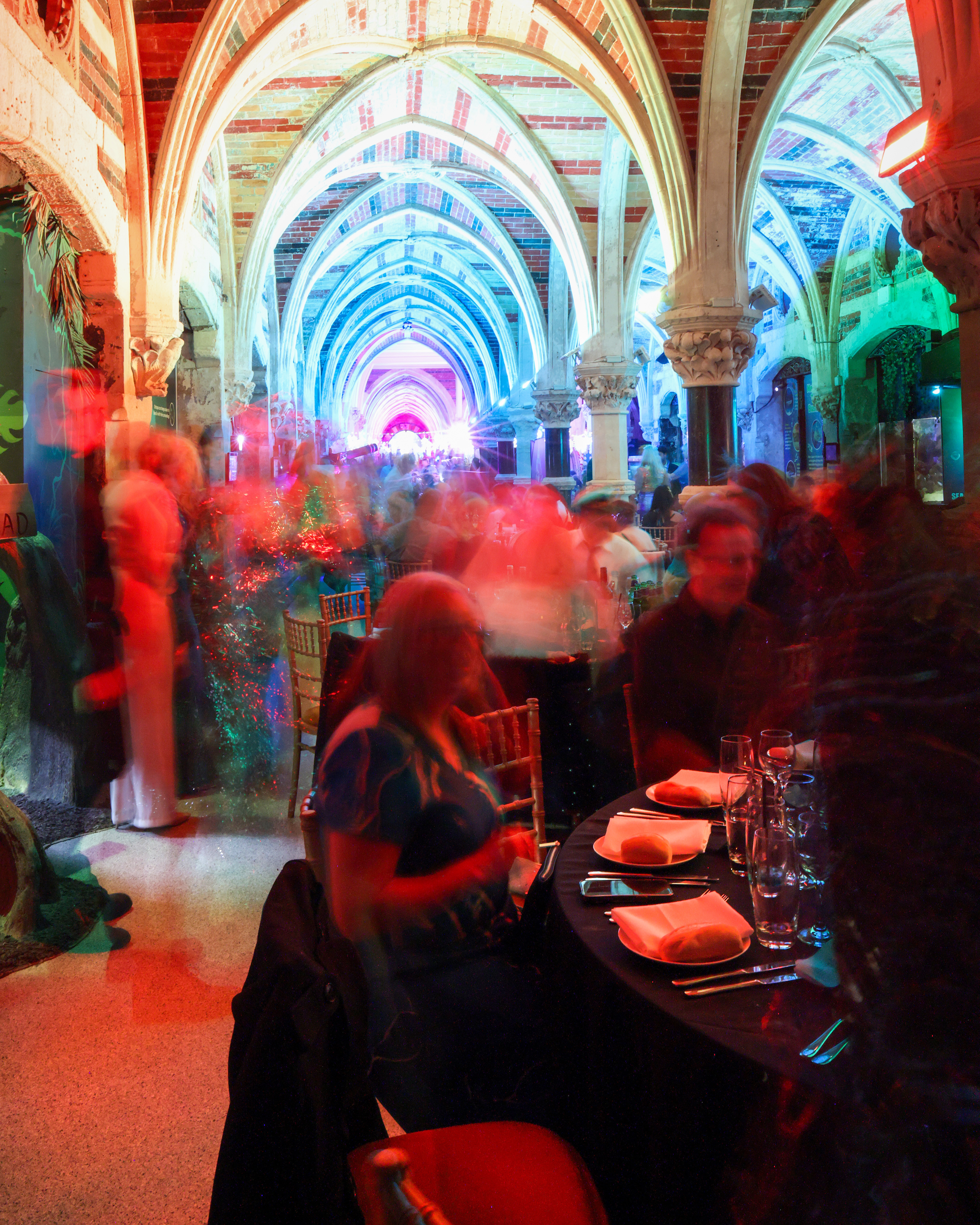 Vibrant SEA LIFE Brighton venue with dynamic lighting for networking events and celebrations.