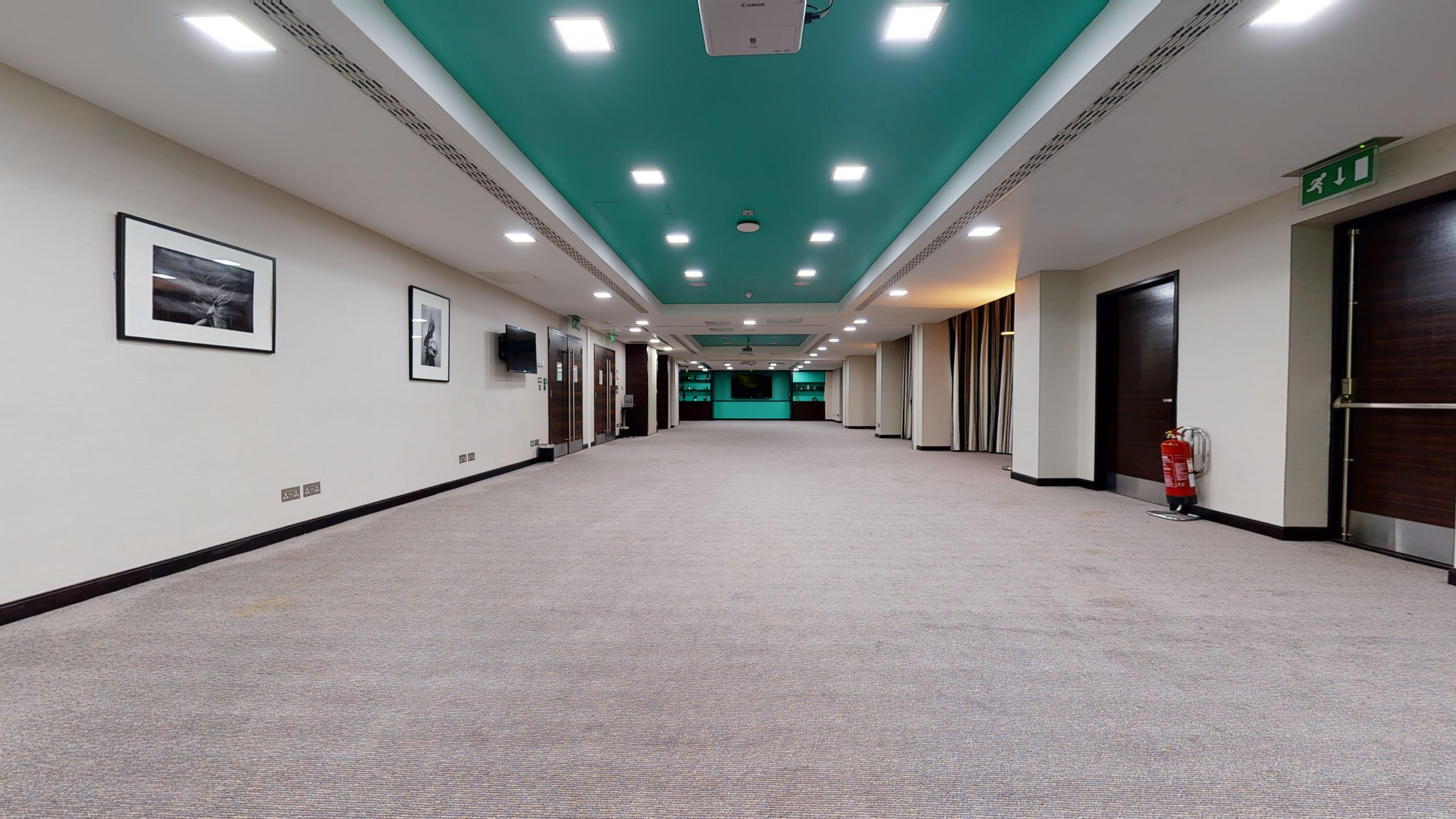 Spacious corridor at DoubleTree London Kensington for networking events and pre-functions.