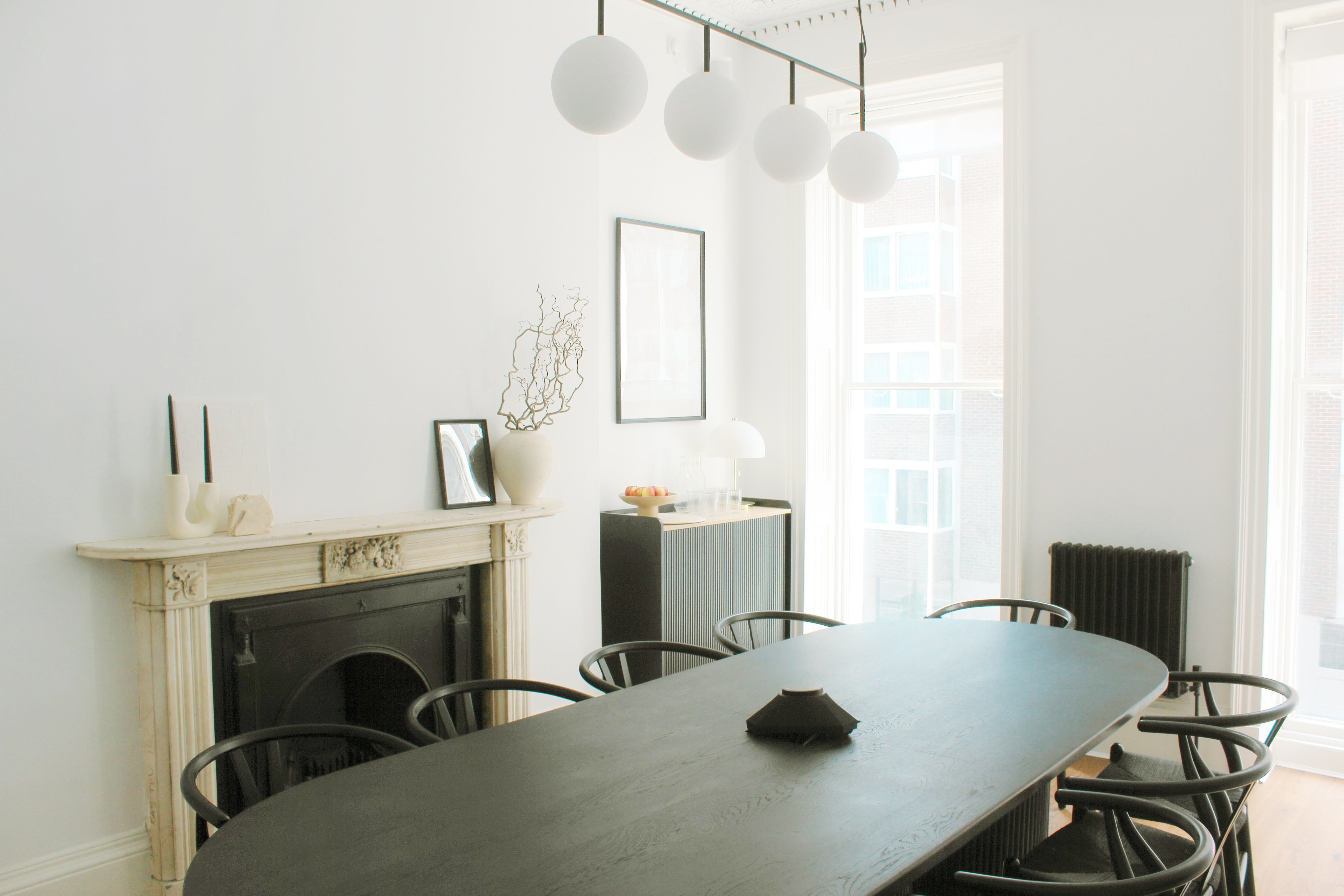 Modern meeting space at 34 Bloomsbury with sleek black table for intimate gatherings.