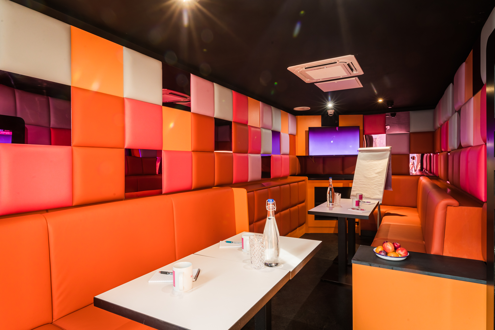Vibrant private karaoke room at Lucky Voice Liverpool Street for creative gatherings.