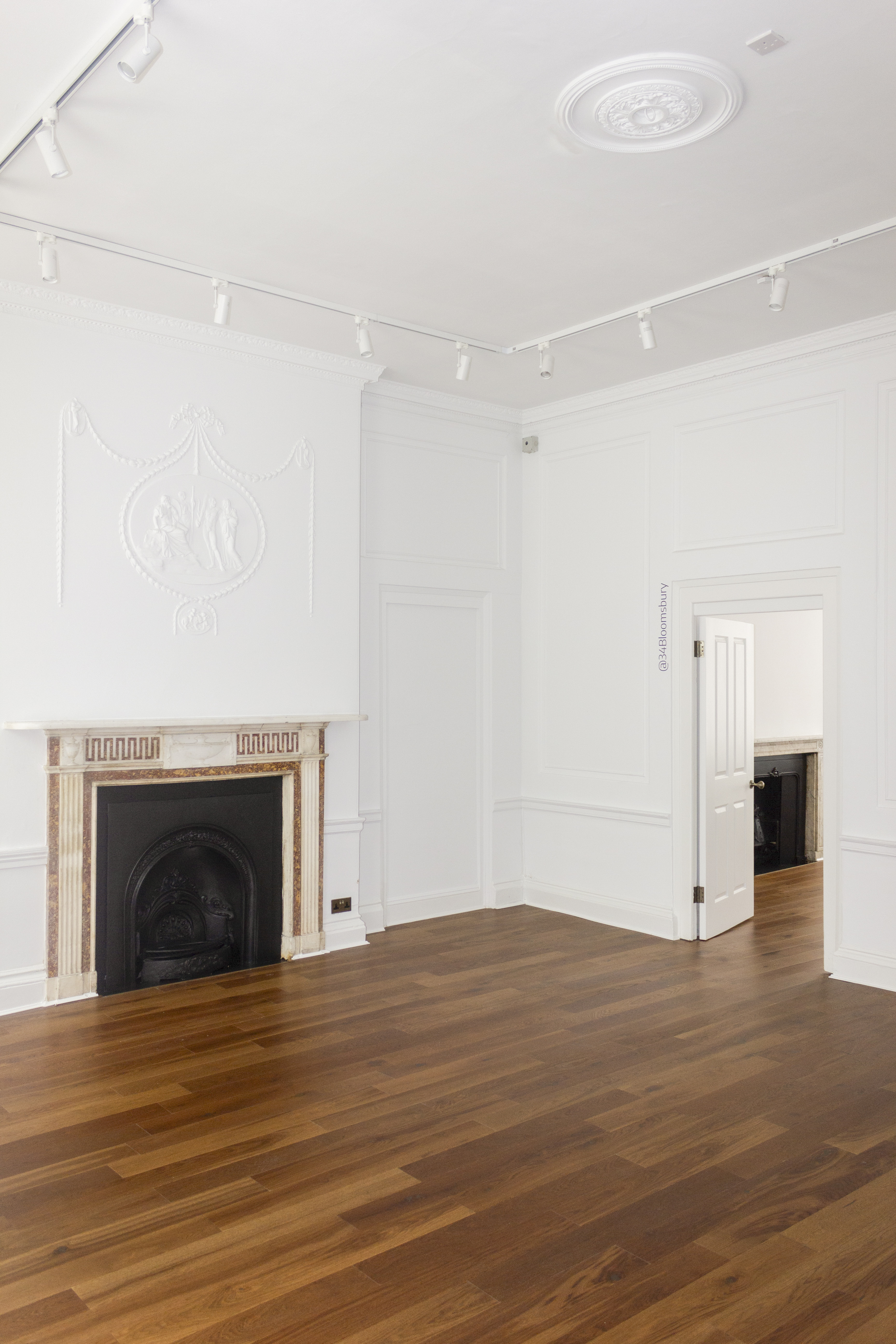 Morrell Room event space with fireplace, ideal for intimate gatherings and meetings.