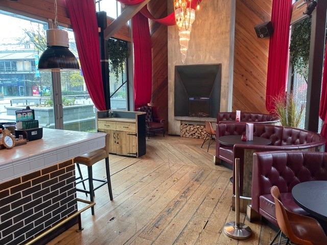 Stylish Impossible Main Bar with cozy seating, ideal for networking events and celebrations.